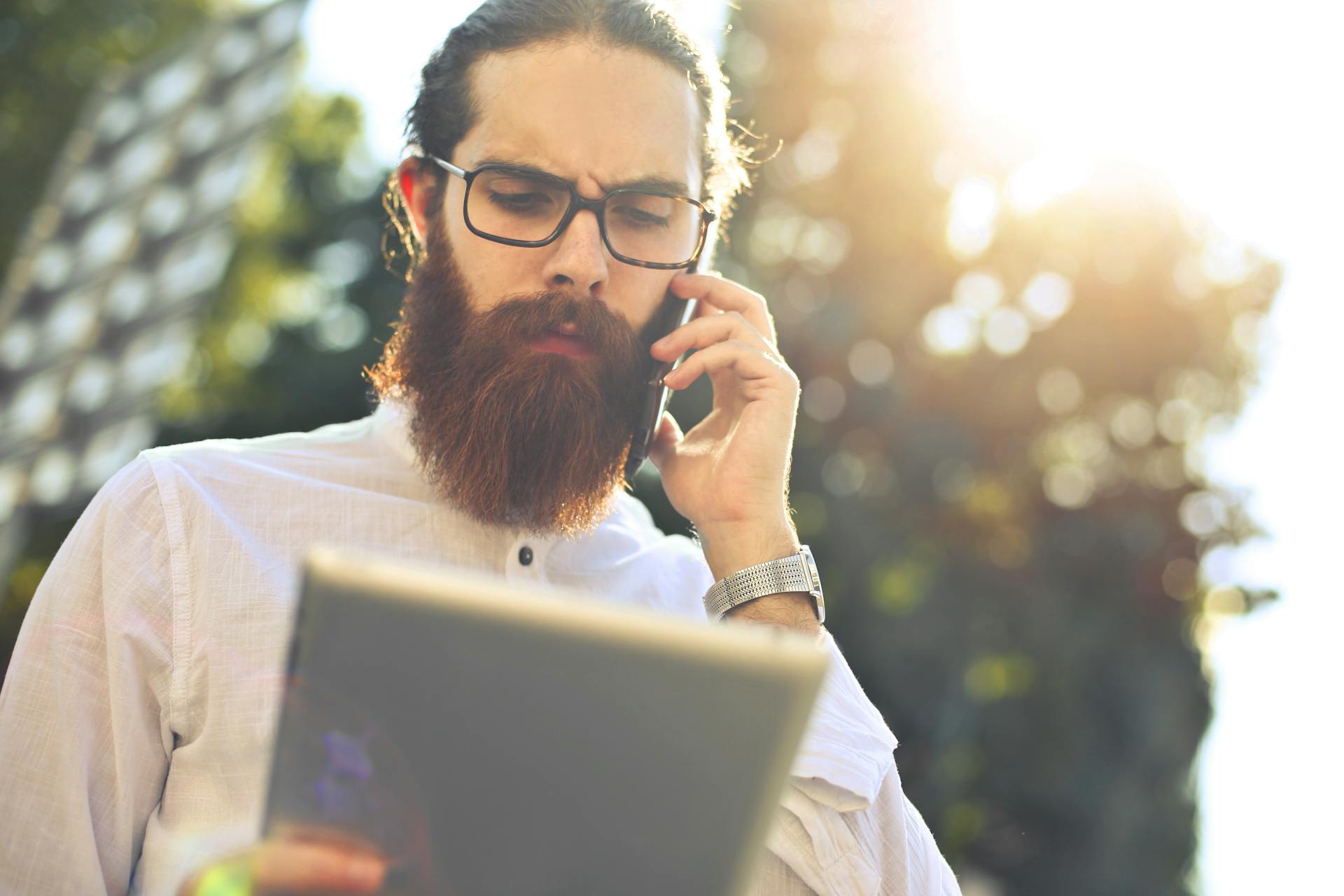 A man attending a call | Source: Pexels