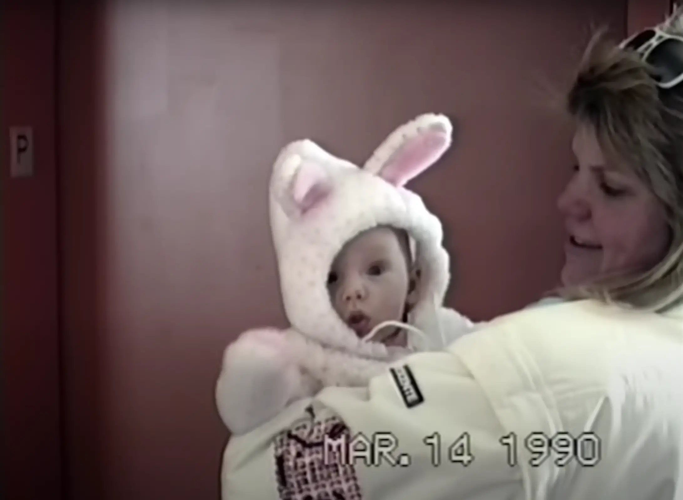The girl as a baby with her mother | Source: youtube.com/channel/UCqECaJ8Gagnn7YCbPEzWH6g