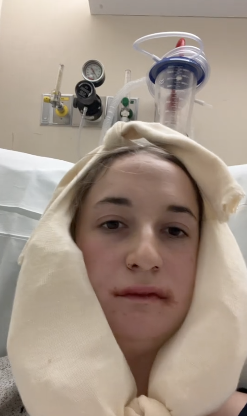 Maddie in hospital after undergoing double jaw surgery from a post dated October 24, 2023. | Source: TikTok/maddieakamofo