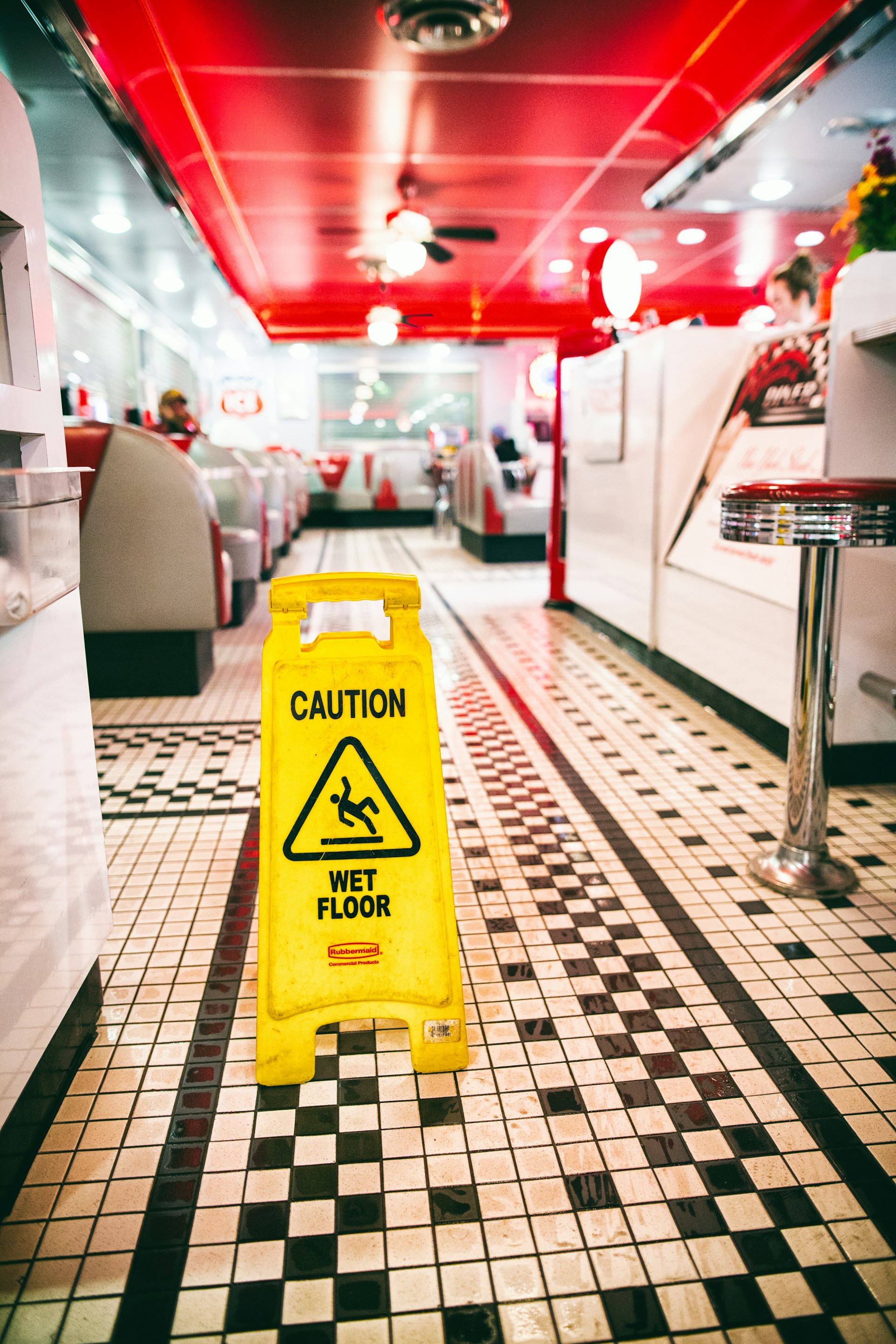 A sign of caution on the floor | Source: Unsplash