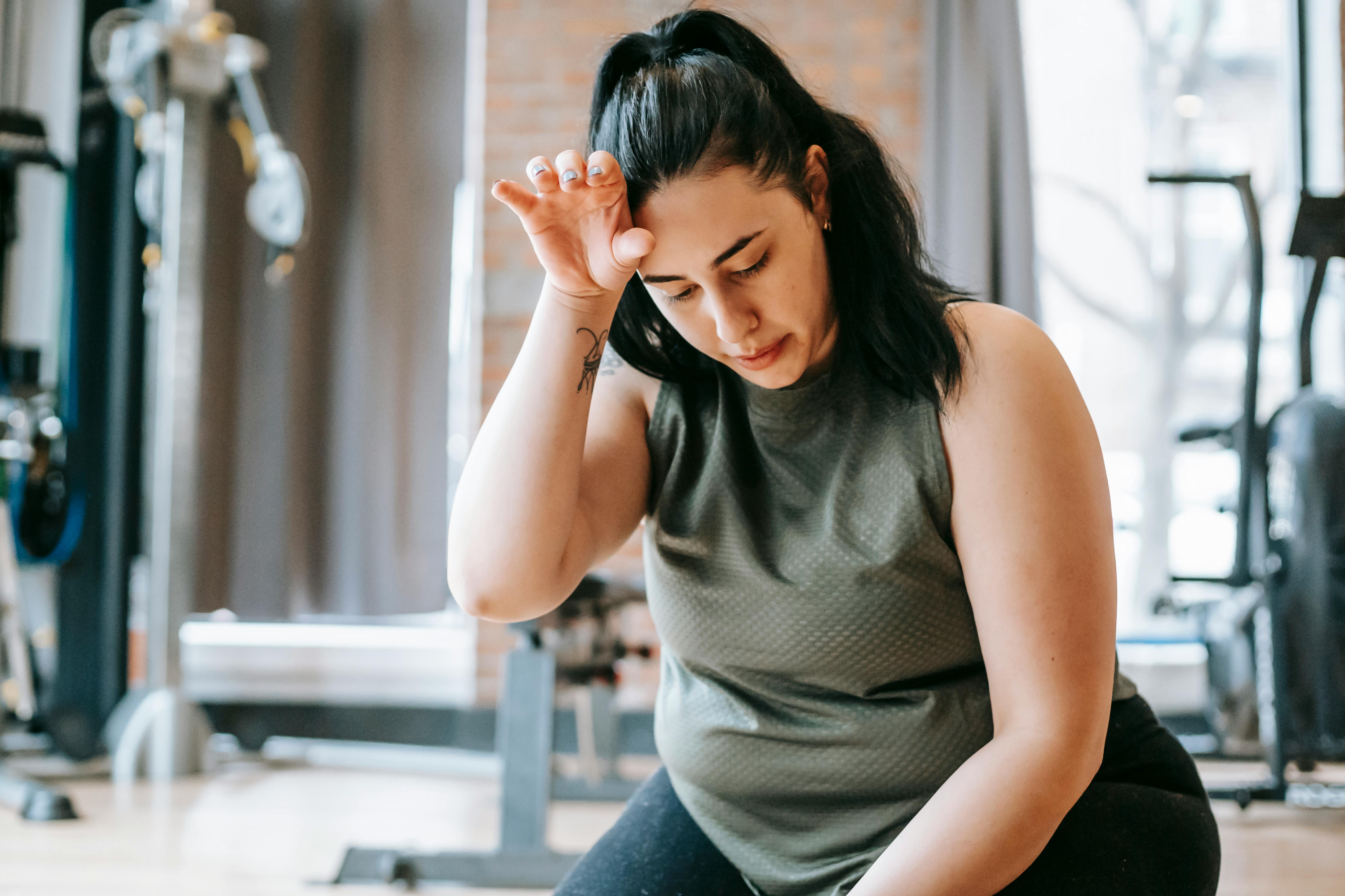An athlete appears fatigued after training. | Source: Pexels