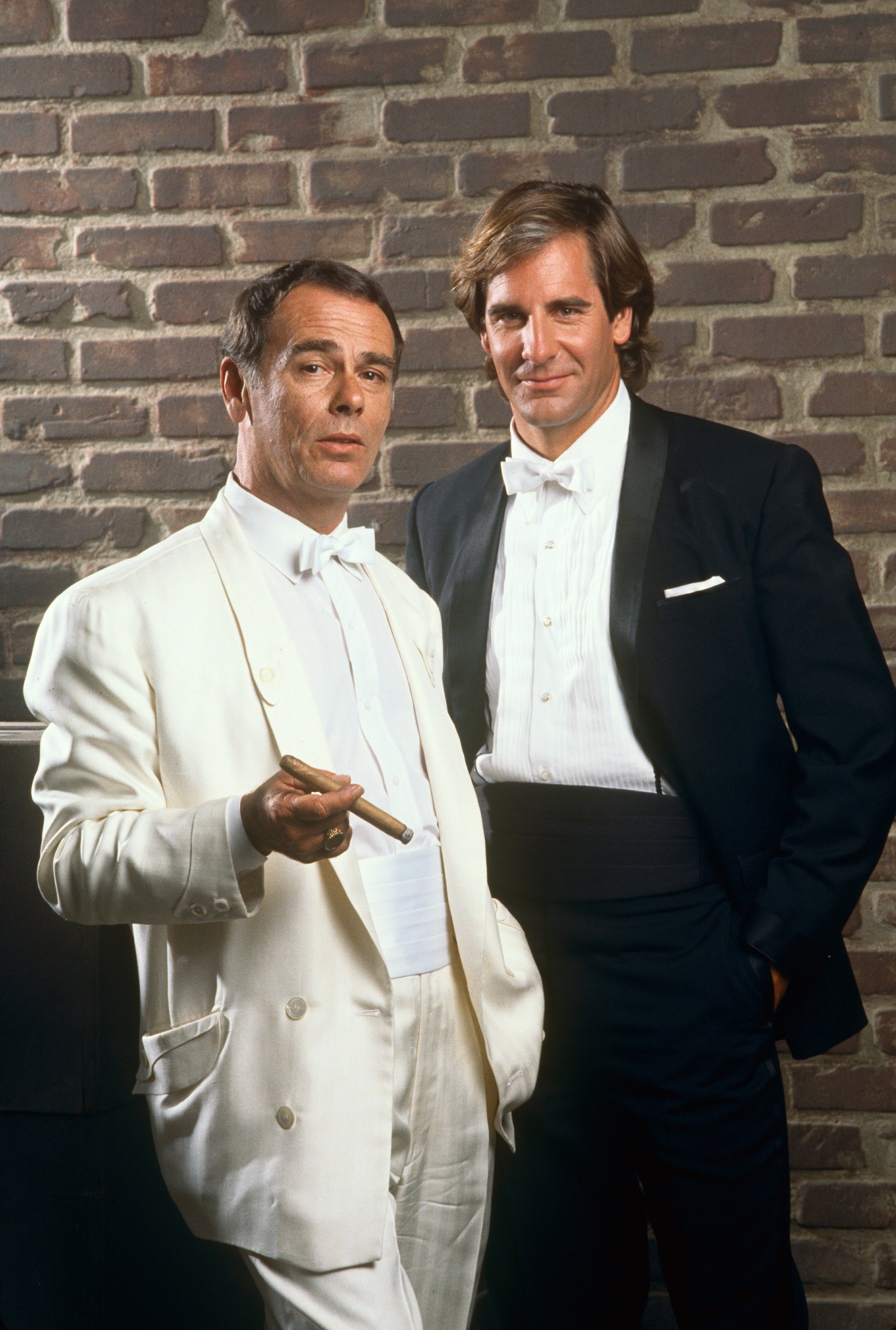 Stars of TV's "Quantum Leap," Dean Stockwell (left) and Scott Bakula, pose in character during a 1989 Hollywood, California, photo portrait session. | Source: Getty Images.