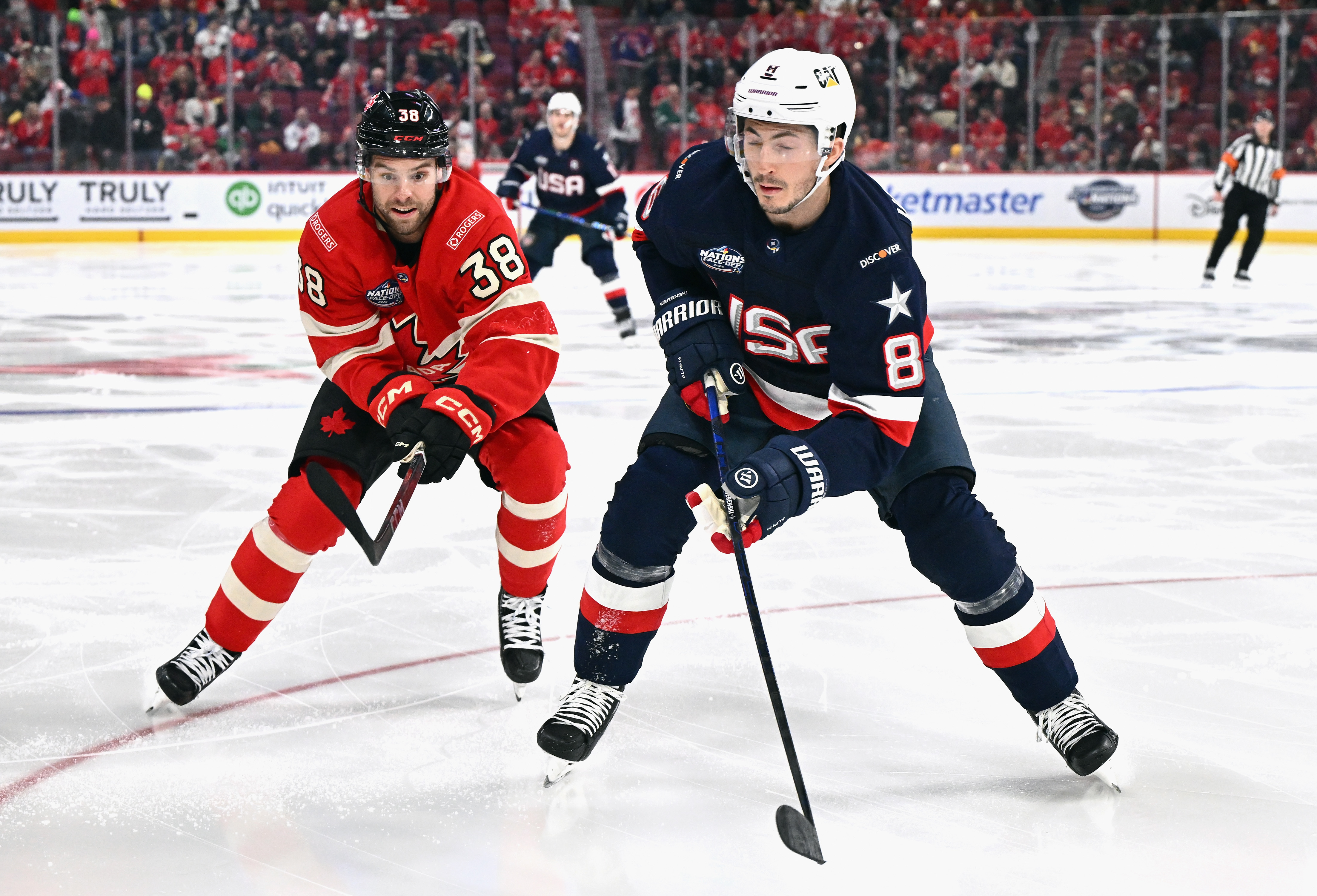 Brandon Hagel #38 of Team Canada checks Zach Werenski #8 of Team USA during the second period in the 4 Nations Face-Off game at the Bell Centre on February 15, 2025 in Montreal | Source: Getty Images