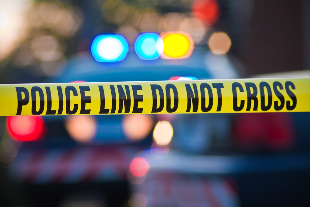 A photo of police vehicle lights at the scene of an incident. | Photo: Shutterstock