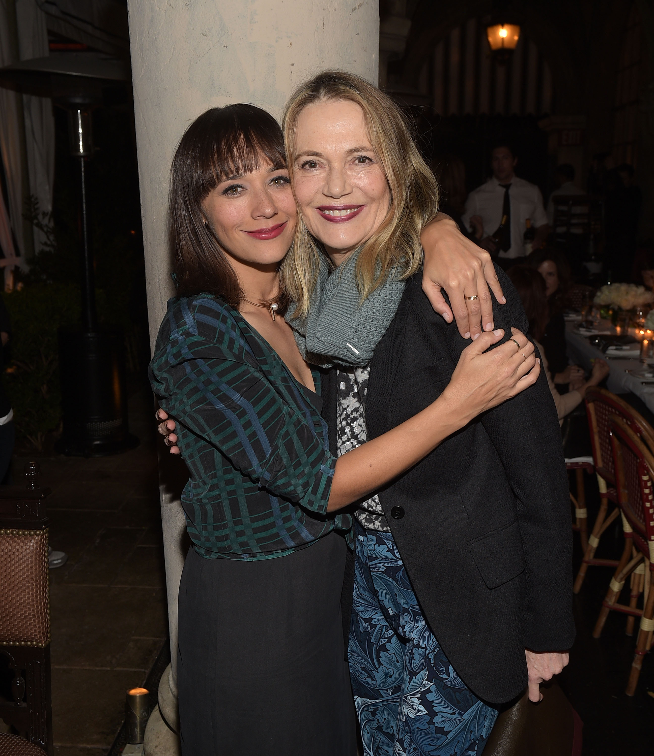 Rashida Jones and Peggy Lipton pose at the Equipment and Vanity Fair Dinner hosted by Rashida Jones and Krista Smith at Chateau Marmont on December 8, 2015, in Los Angeles, California | Source: Getty Images