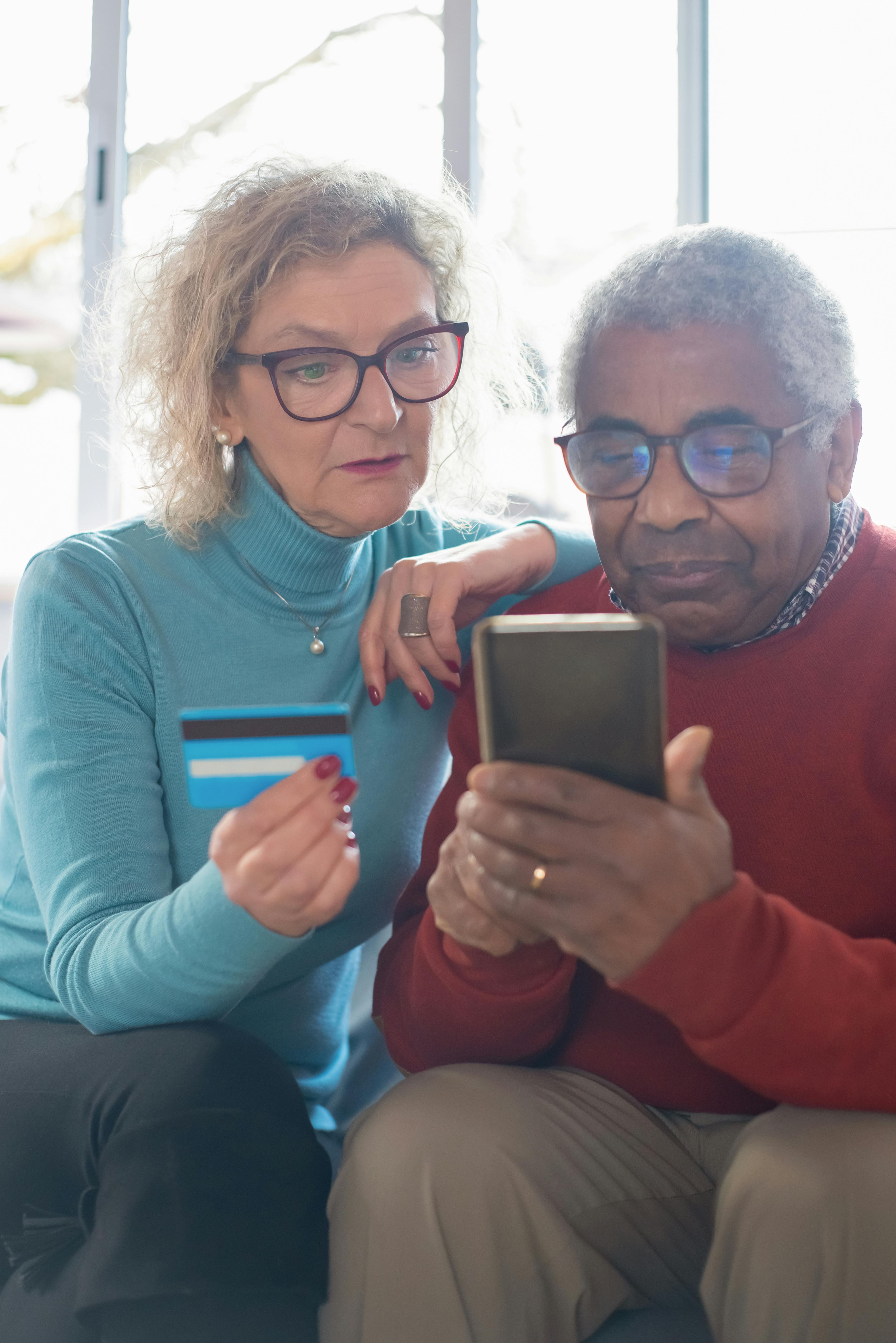 A couple checking their credit card rewards | Source: Pexels