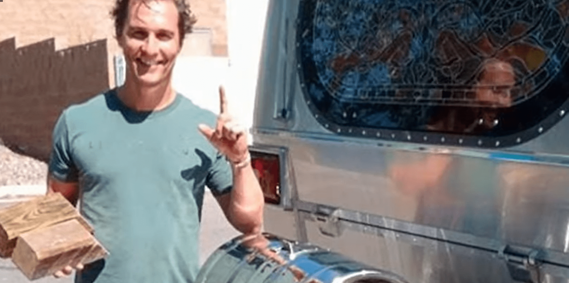 Matthew McConaughey standing next to an Airstream trailer | Source: YouTube/Famous Entertainment
