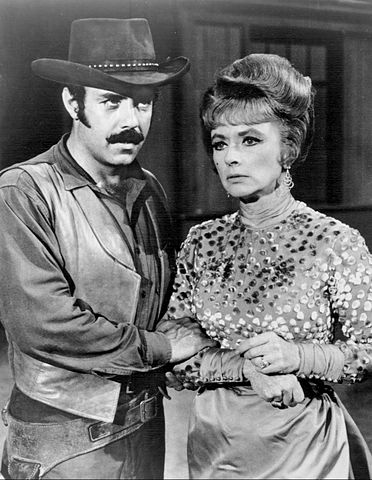 Amanda Blake  and Pernell Roberts on "Gunsmoke" in 1968. | Source: Wikipedia Commons.