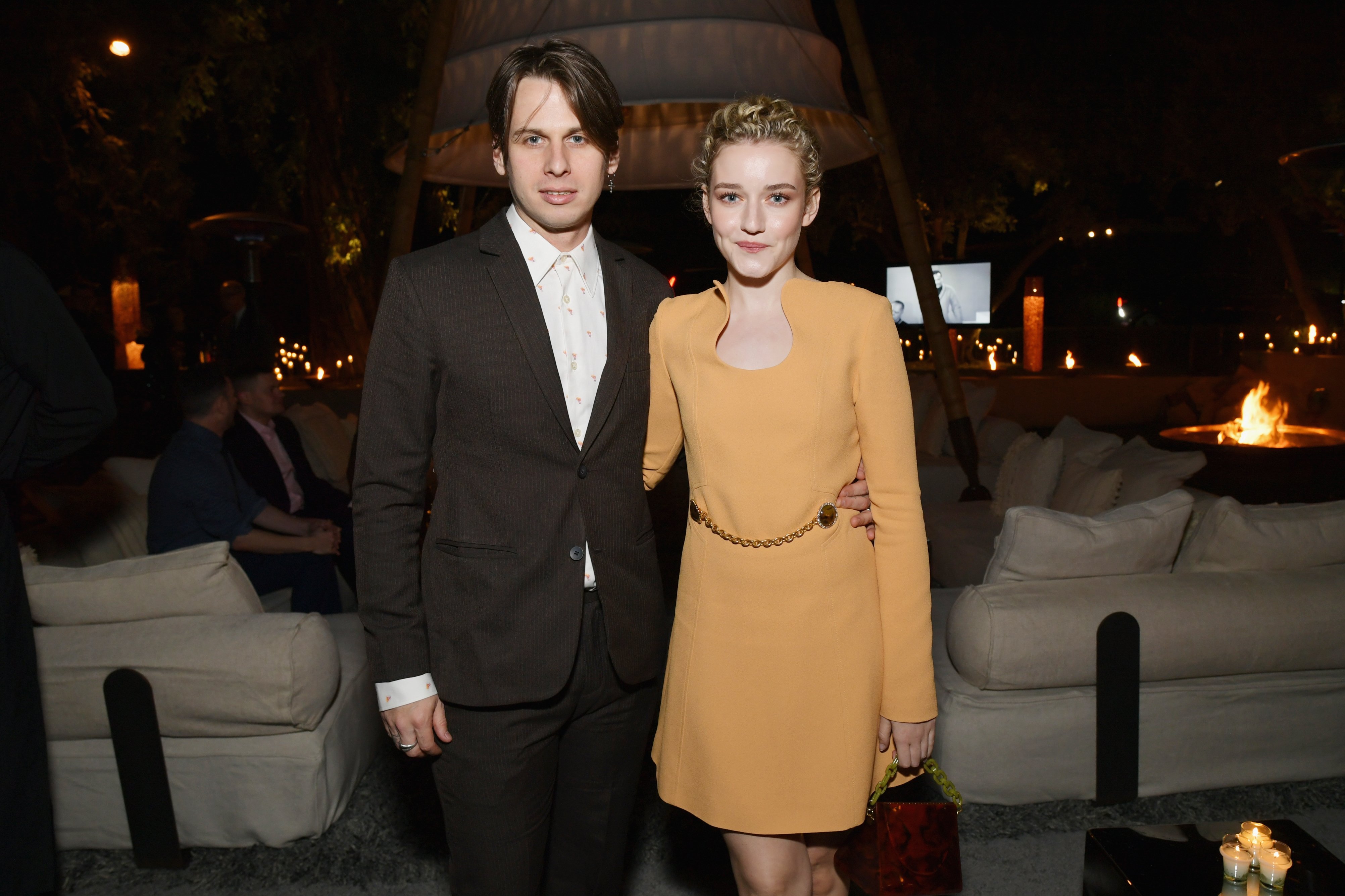 Julia Garner and Mark Foster at the Netflix 2019 Nominees Toast on January 26, 2019 | Source: Getty Images