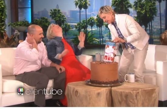 Ellen cuts cake