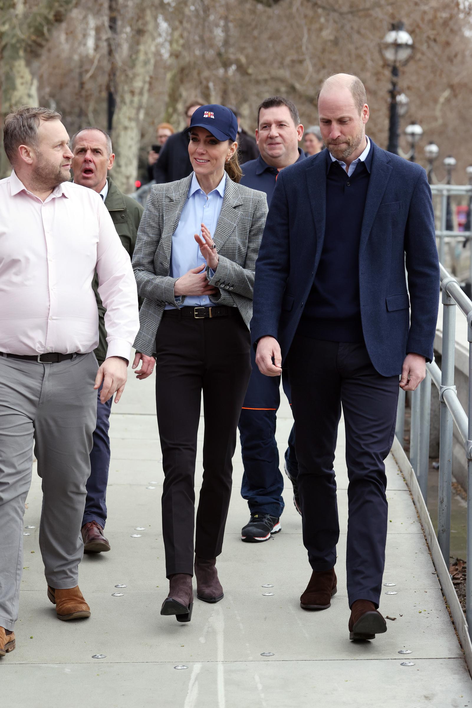 Catherine, Princess of Wales waves to well-wishers as she and Prince William, Prince of Wales walk along the riverside during their visit to the RNLI Tower Station on 12 March 2026 in London, England. | Source: Getty Images