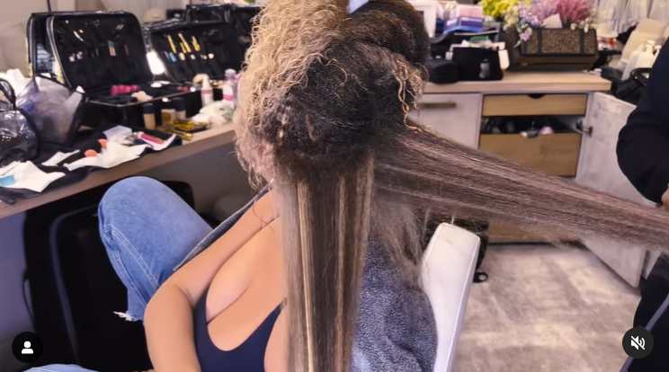 Another section of Beyoncé's hair being ironed in a video shared in April 2024. | Source: Instagram/beyonce