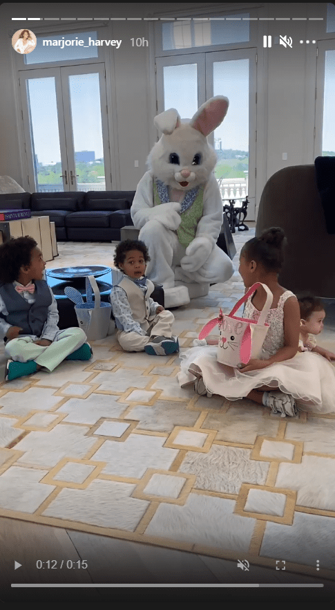 Marjorie and Steve Harvey’s grandchildren playing with a dressed up “rabbit” on Easter. | Source: Instagram/marjorie_harvey