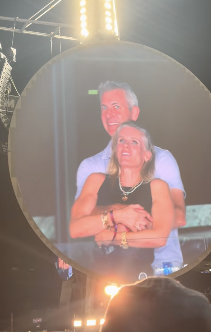 Andy Byron and Kristin Cabot share an embrace during Coldplay's Boston concert on July 16, 2025 | Source: TikTok/@instaagraace