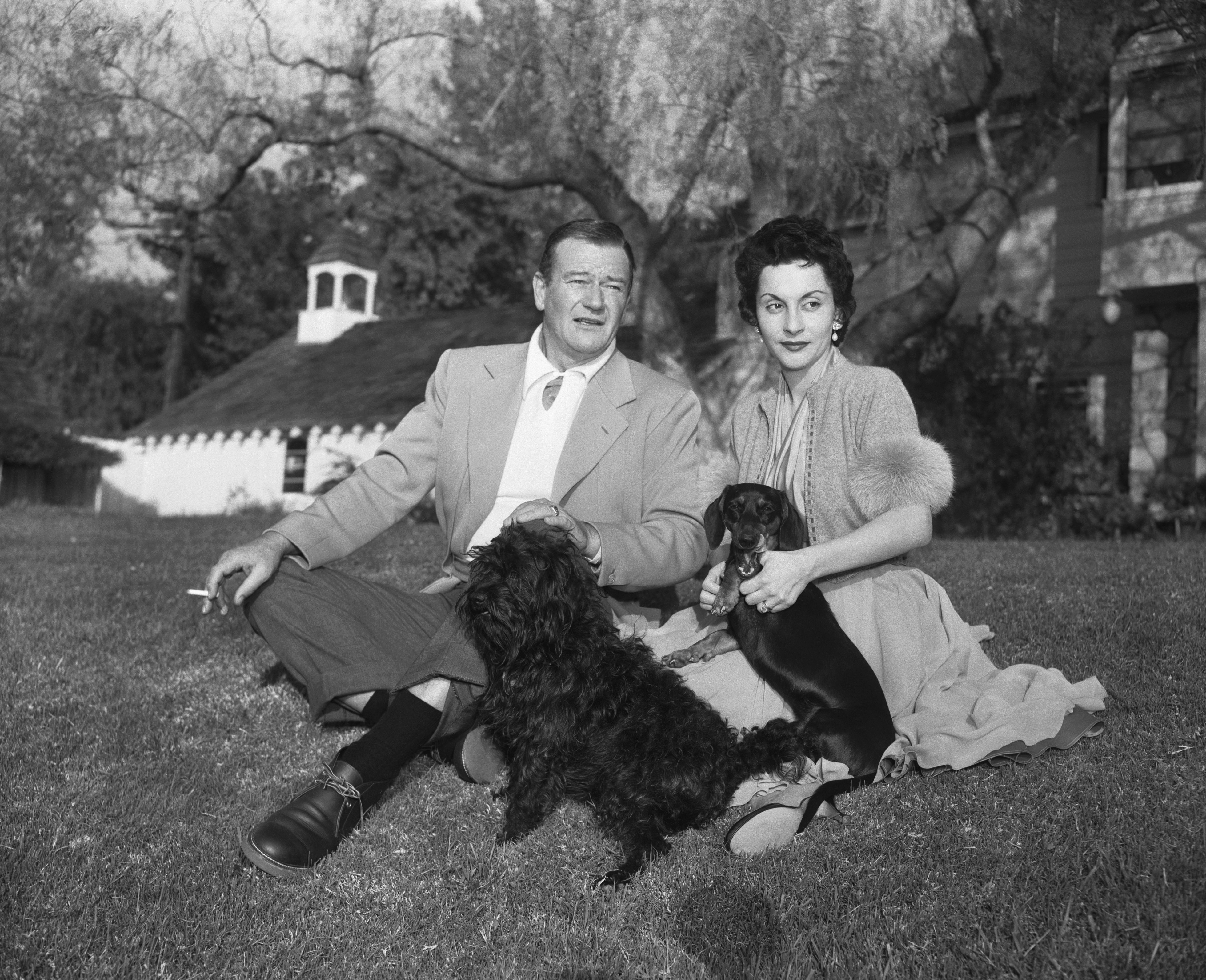 Actor John Wayne and Wife Pilar Wayne on April 19 1956 | Source: Getty Images