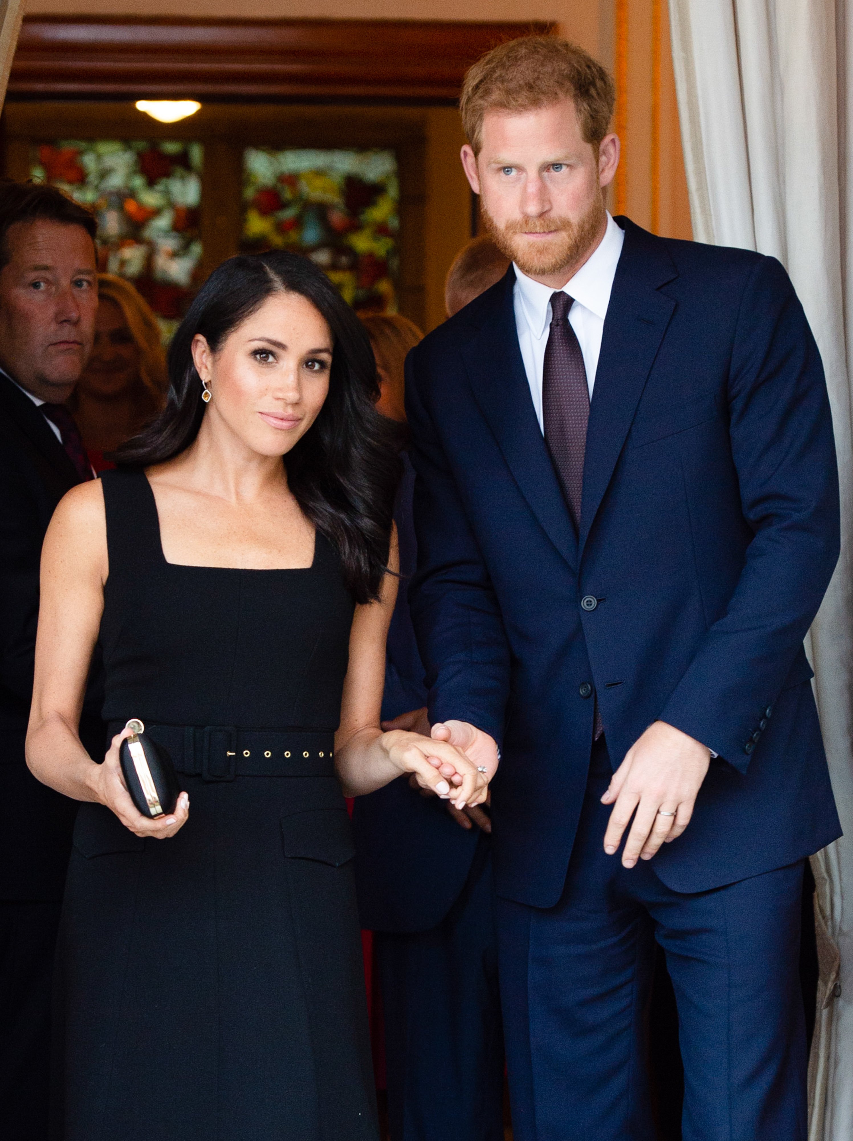 Prince Harry, Duke of Sussex and Meghan, Duchess of Sussex attend a Summer Party at the British Ambassador's residence at Glencairn House during their visit to Ireland on July 10, 2018 in Dublin, Ireland | Source: Getty Images 