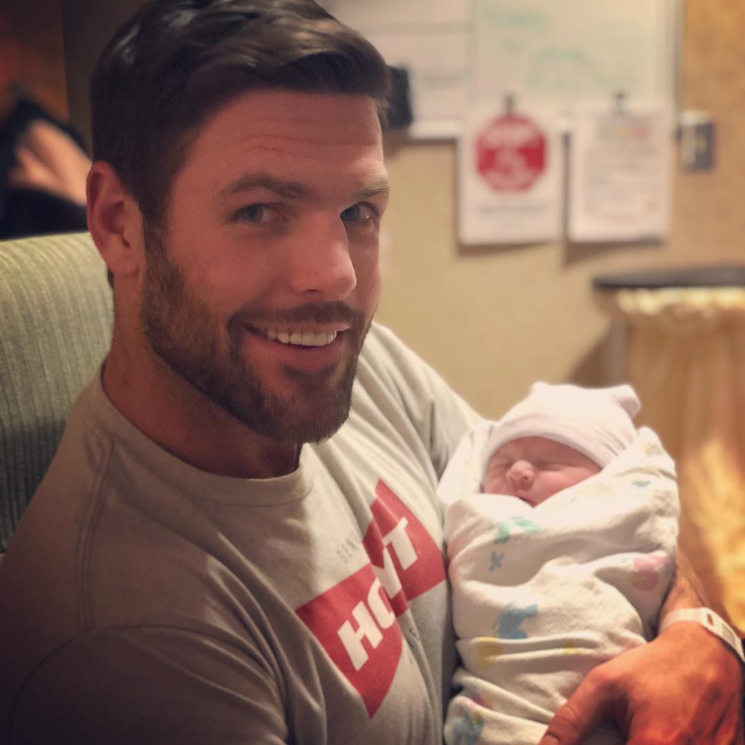 Proud father-of-two Mike Fisher introduces baby Jacob to the world. Photo credit: Instagram/@carrieunderwood
