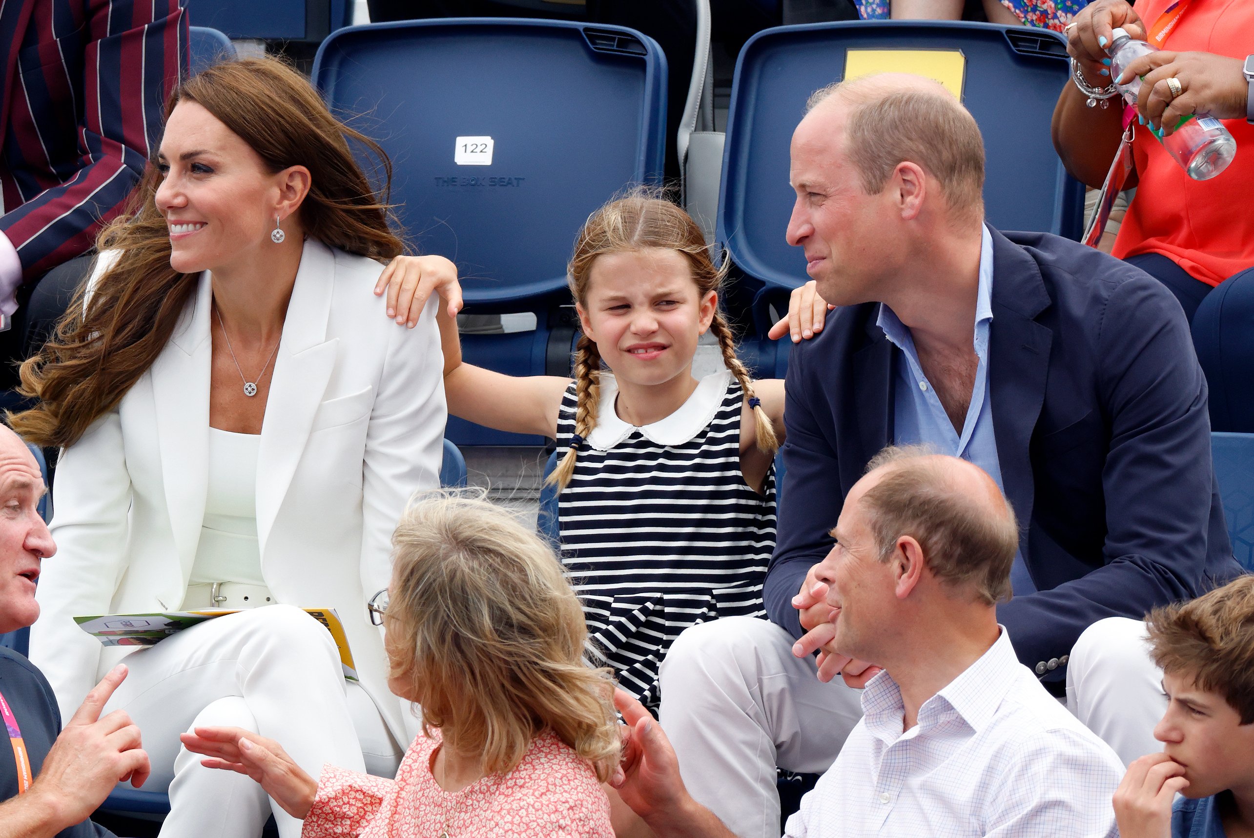 Duchess Kate, Princess Charlotte, and Prince William watch the England v India Women's hockey match during the Commonwealth Games on August 2, 2022, in Birmingham, England | Source: Getty Images