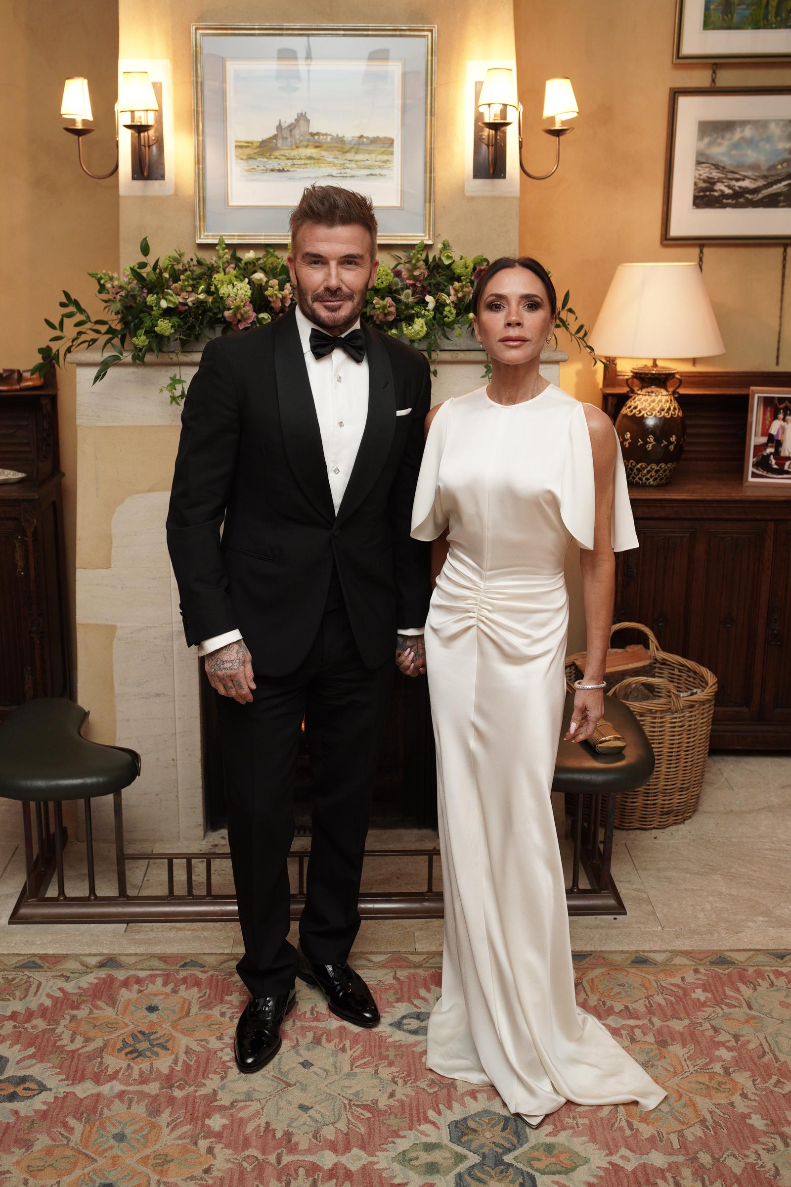 David and Victoria Beckham at a dinner in celebration of Slow Food at King Charles III's Gloucestershire estate on February 7, 2025, inTetbury, England | Source: Getty Images