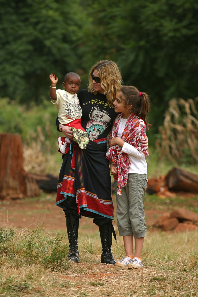 David Banda, the one-year-old Malawian boy, Madonna, her biological daughter Lourdes, 2007 | STRINGER/AFP via Getty Images