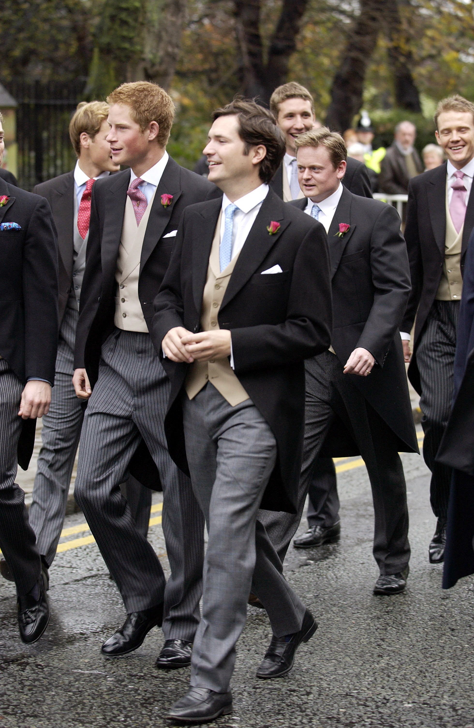 Prince Harry joining other ushers on their way to their friends' wedding at Chester Cathedral. | Source: Getty Images