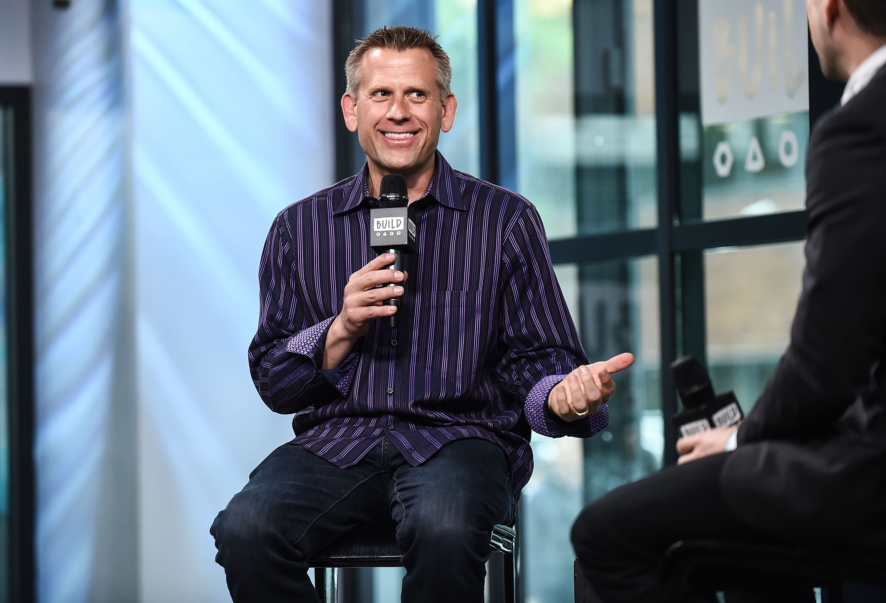 John Brenkus attends the Build Series to discuss his podcast "Brink of Midnight" on June 5, 2017, in New York City | Source: Getty Images