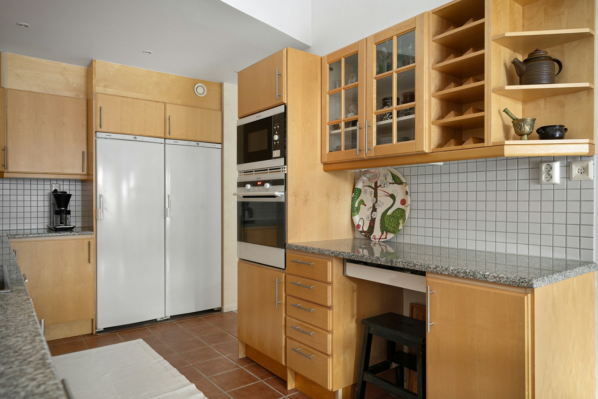 A kitchen with beige cabinets | Source: Unsplash