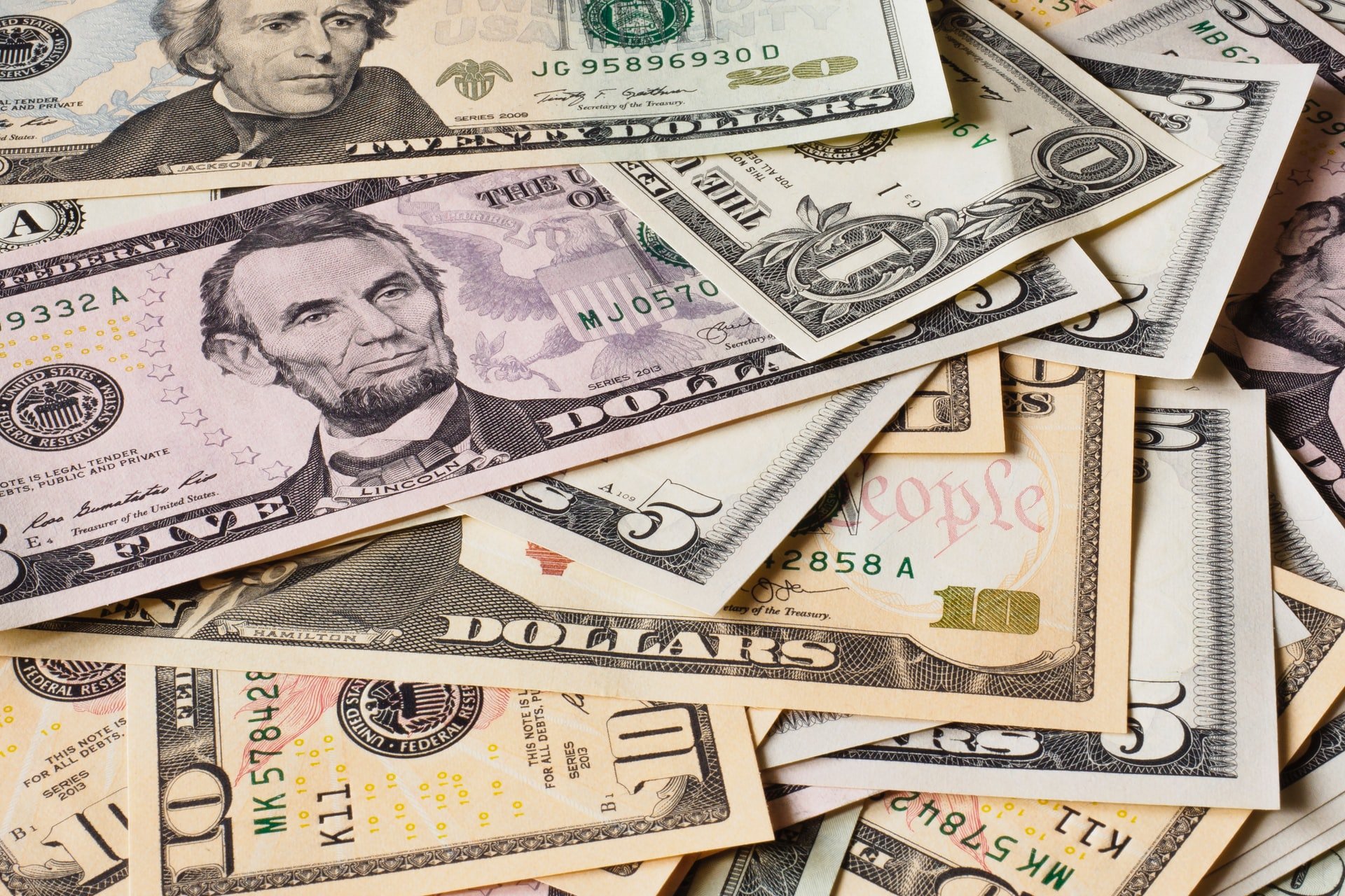 Close up of dollar bills | Source: Unsplash