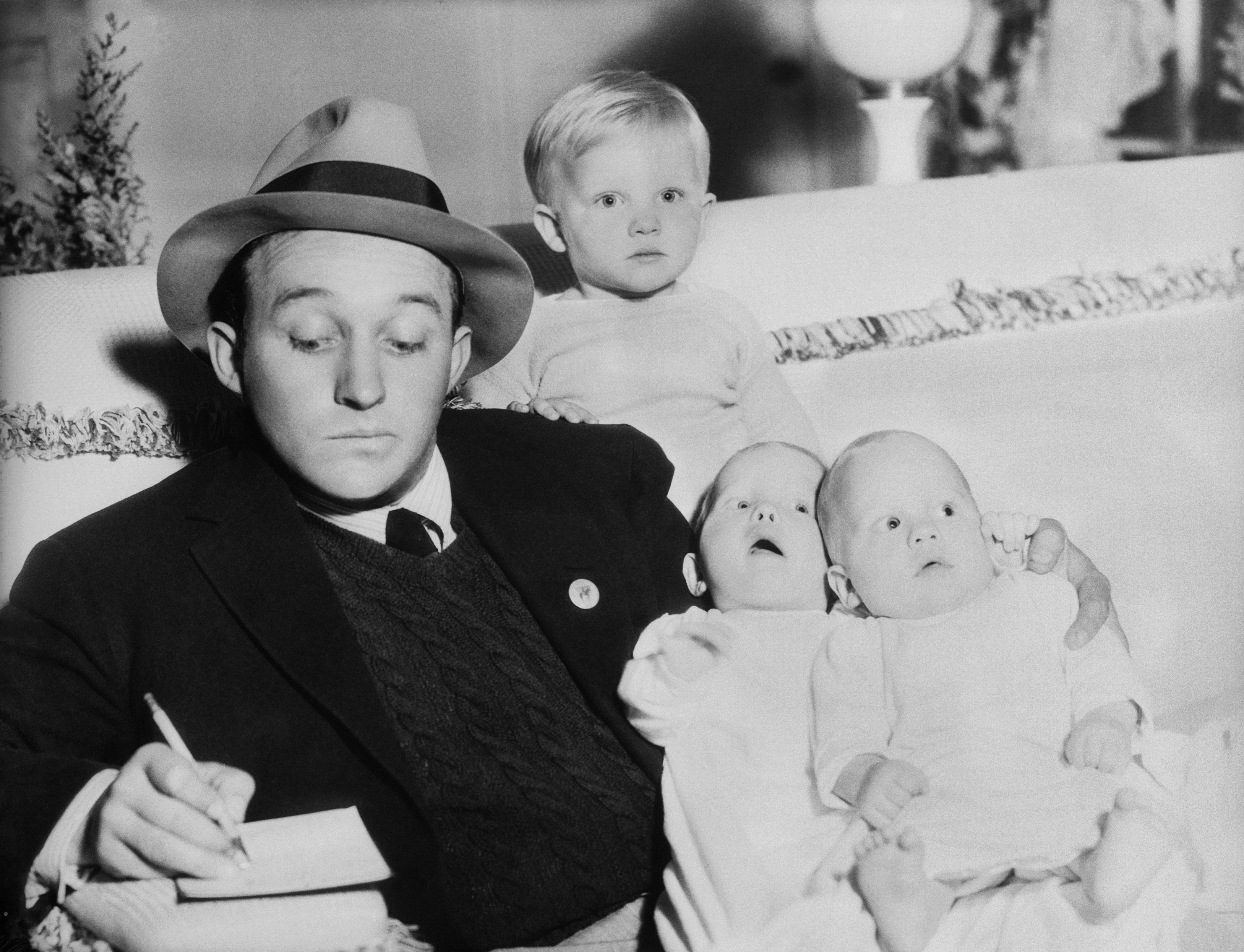 Bing Crosby pose for a picture with his three sons. | Source: Getty Images