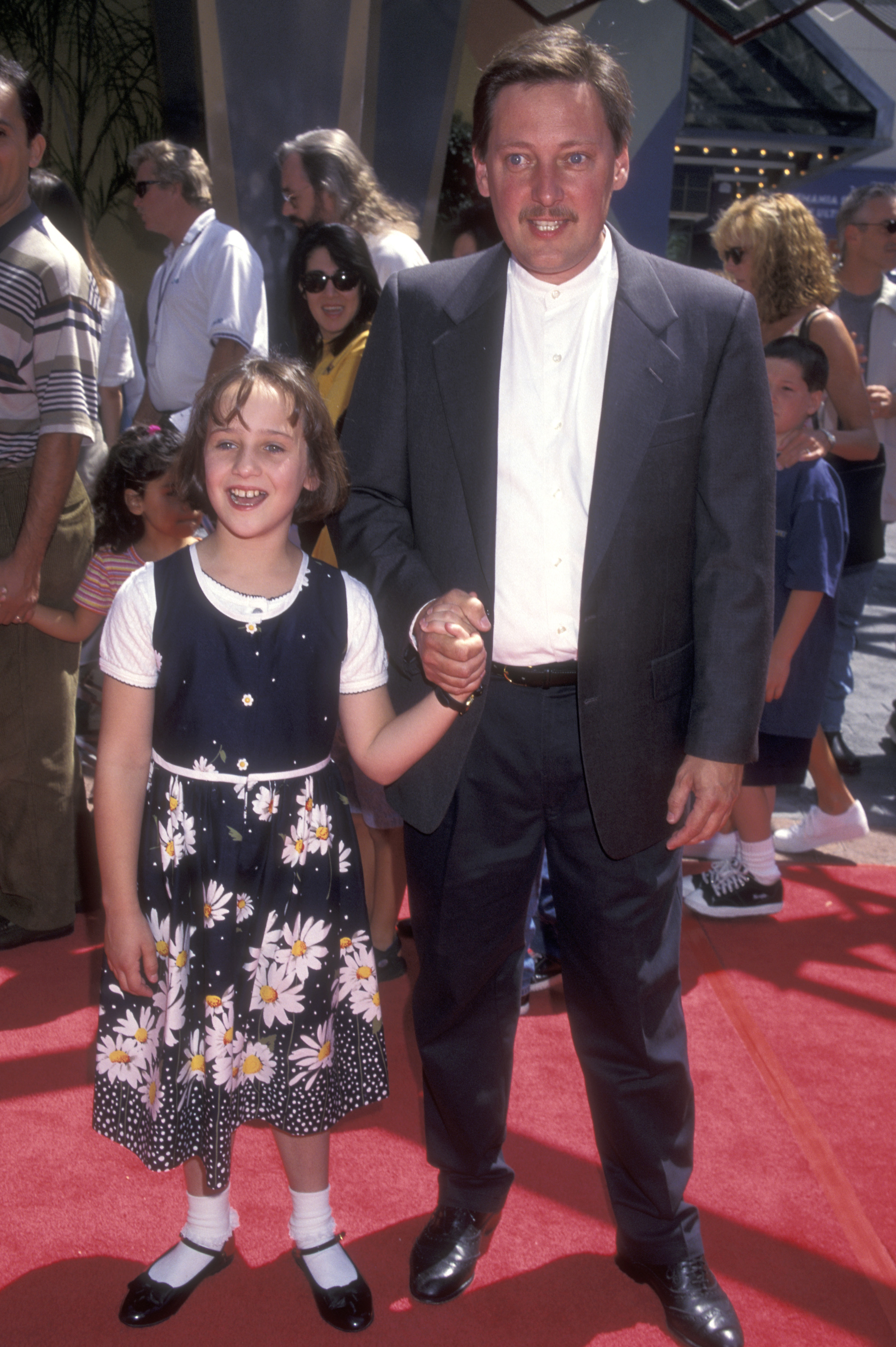 Mara Wilson and father Michael Wilson attend 'A Simple Wish' Universal City Premiere at Cineplex Odeon Universal City Cinemas in Universal City, California, on June 29, 1997. | Source: Getty Images