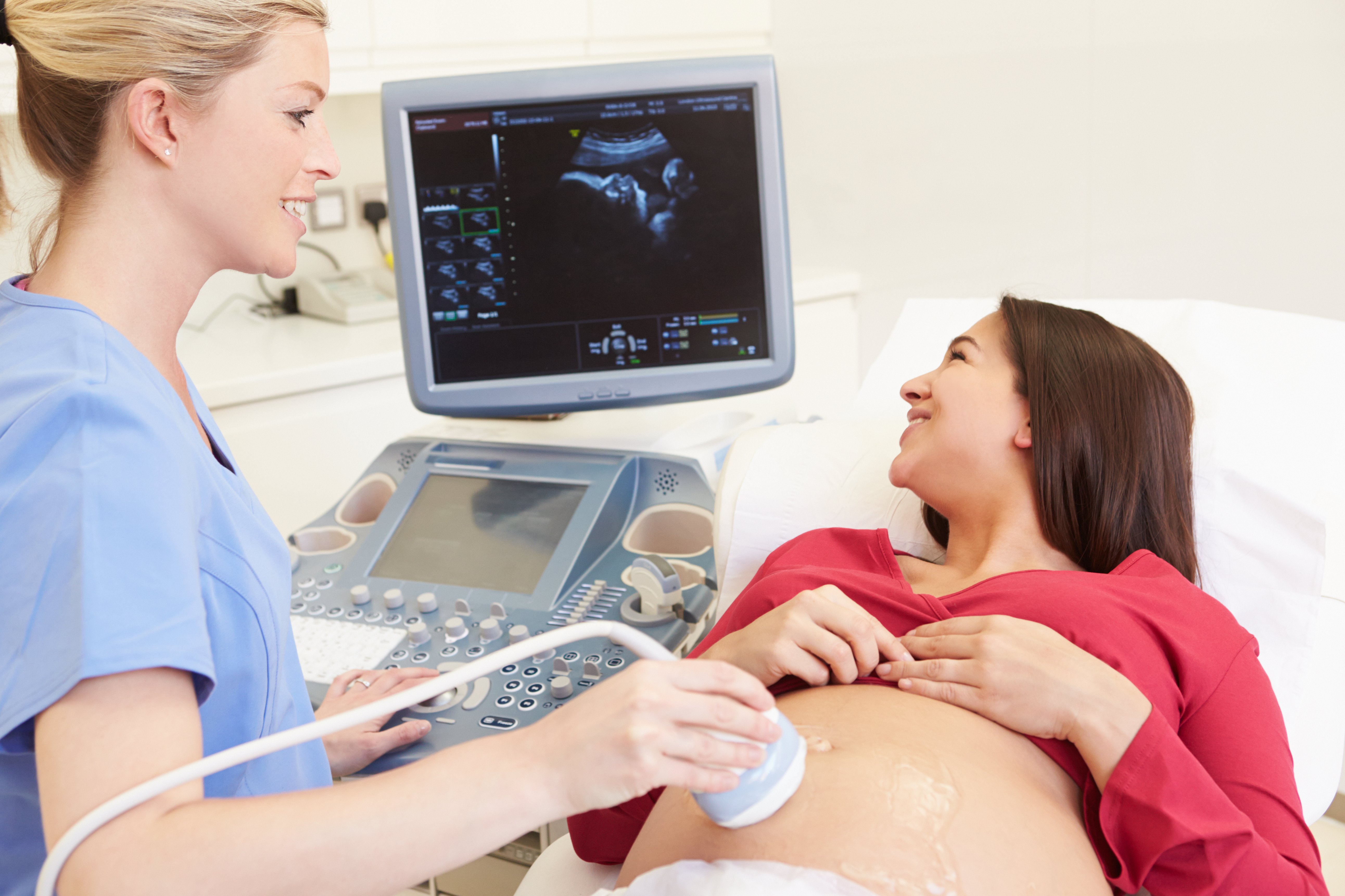 Pregnant Woman Having 4D Ultrasound Scan. | Source: Shutterstock
