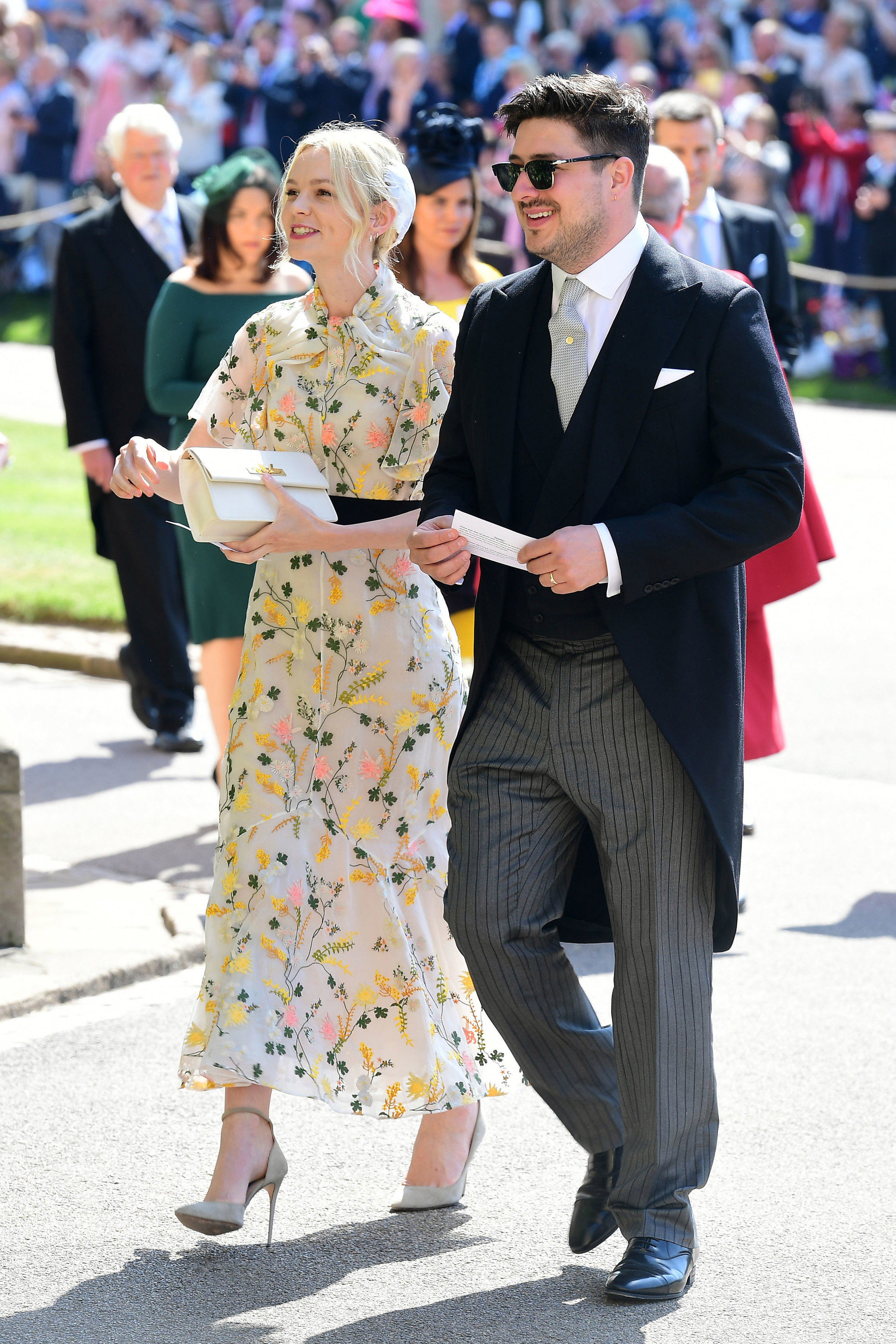 Marcus Mumford and Carey Mulligan arrive at St George's Chapel at Windsor Castle before the wedding of Prince Harry to Meghan Markle on May 19, 2018, in Windsor, England | Source: Getty Images
