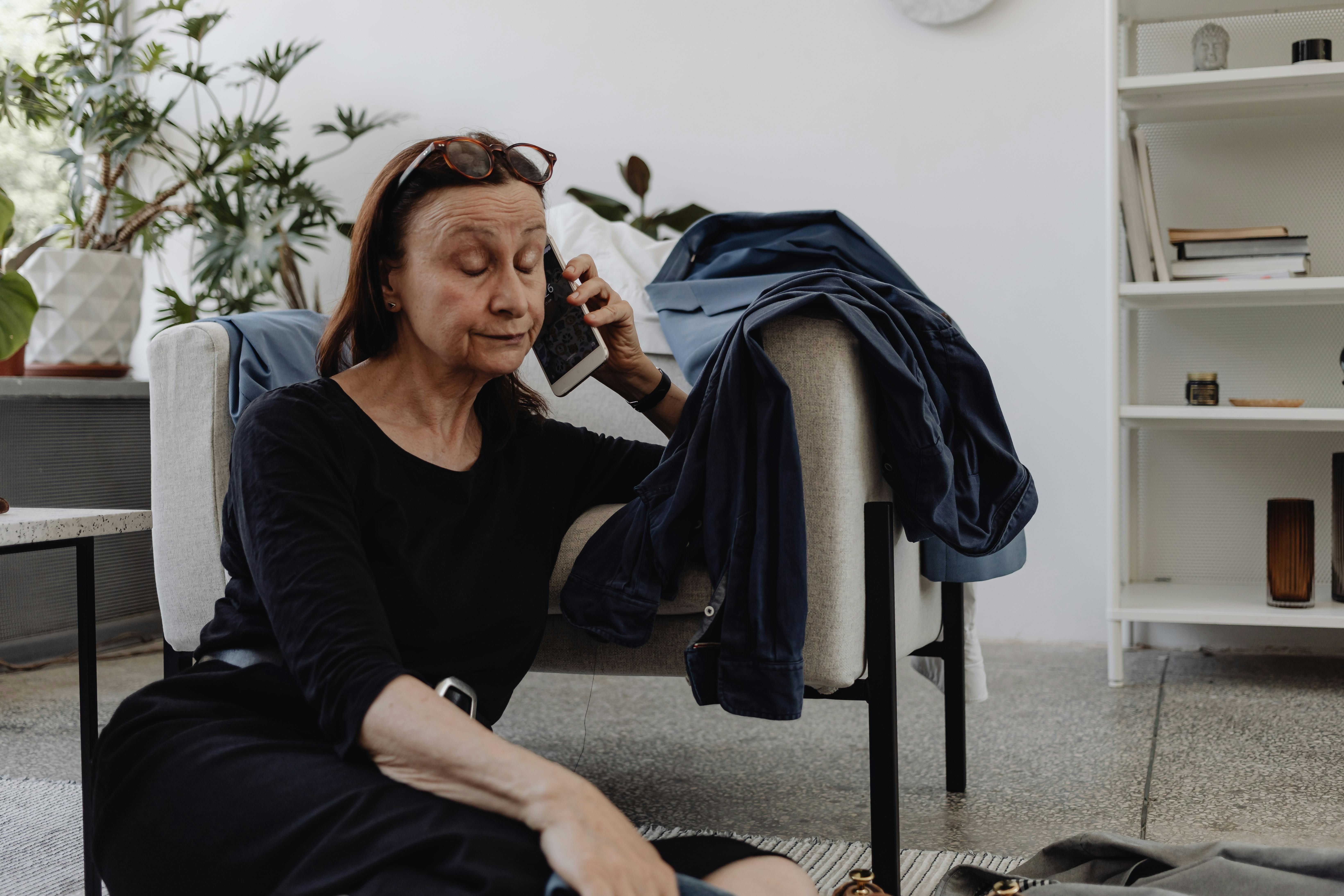 A senior woman with serious expression on phone call | Source: Pexels