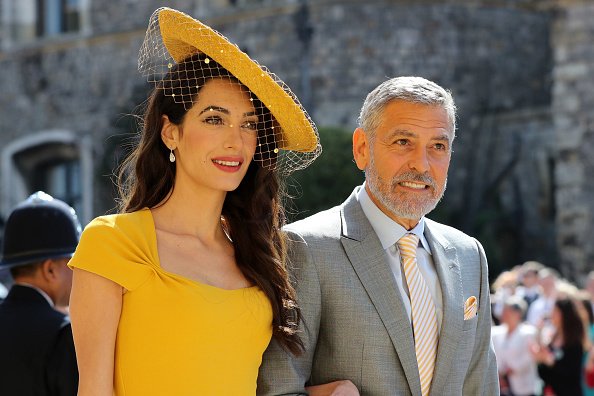 Amal Clooney and George Clooney at Windsor Castle before the wedding of Prince Harry to Meghan Markle on May 19, 2018 in Windsor, England. | Photo: Getty Images
