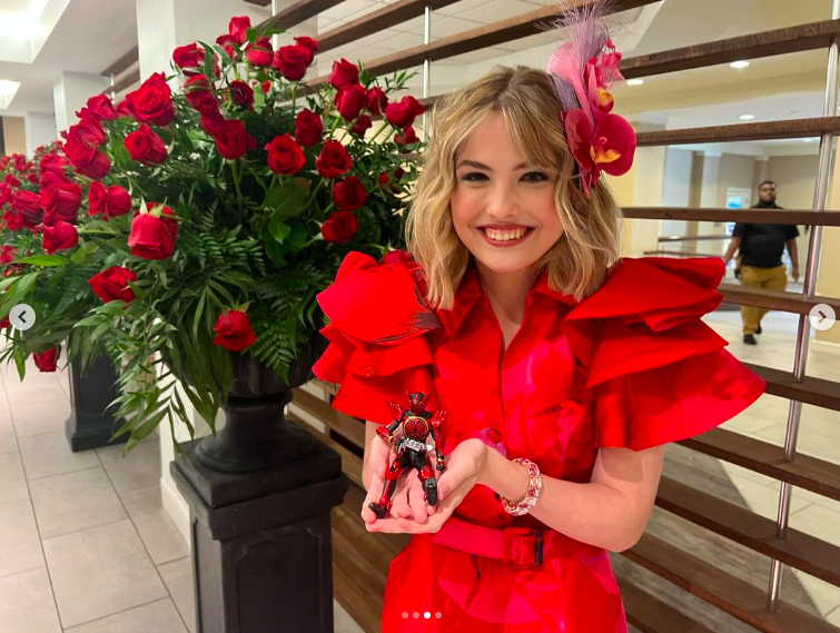 Dannielynn Birkhead posing for a picture with an action figure of her favorite character during the Kentucky Derby weekend, posted on May 5, 2024 | Source: Instagram/larryanddannielynn