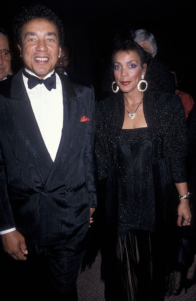 Smokey Robinson and Claudette Rogers at the 21st Annual Songwriter's Hall of Fame, 1990  in New York | Source: Getty Images