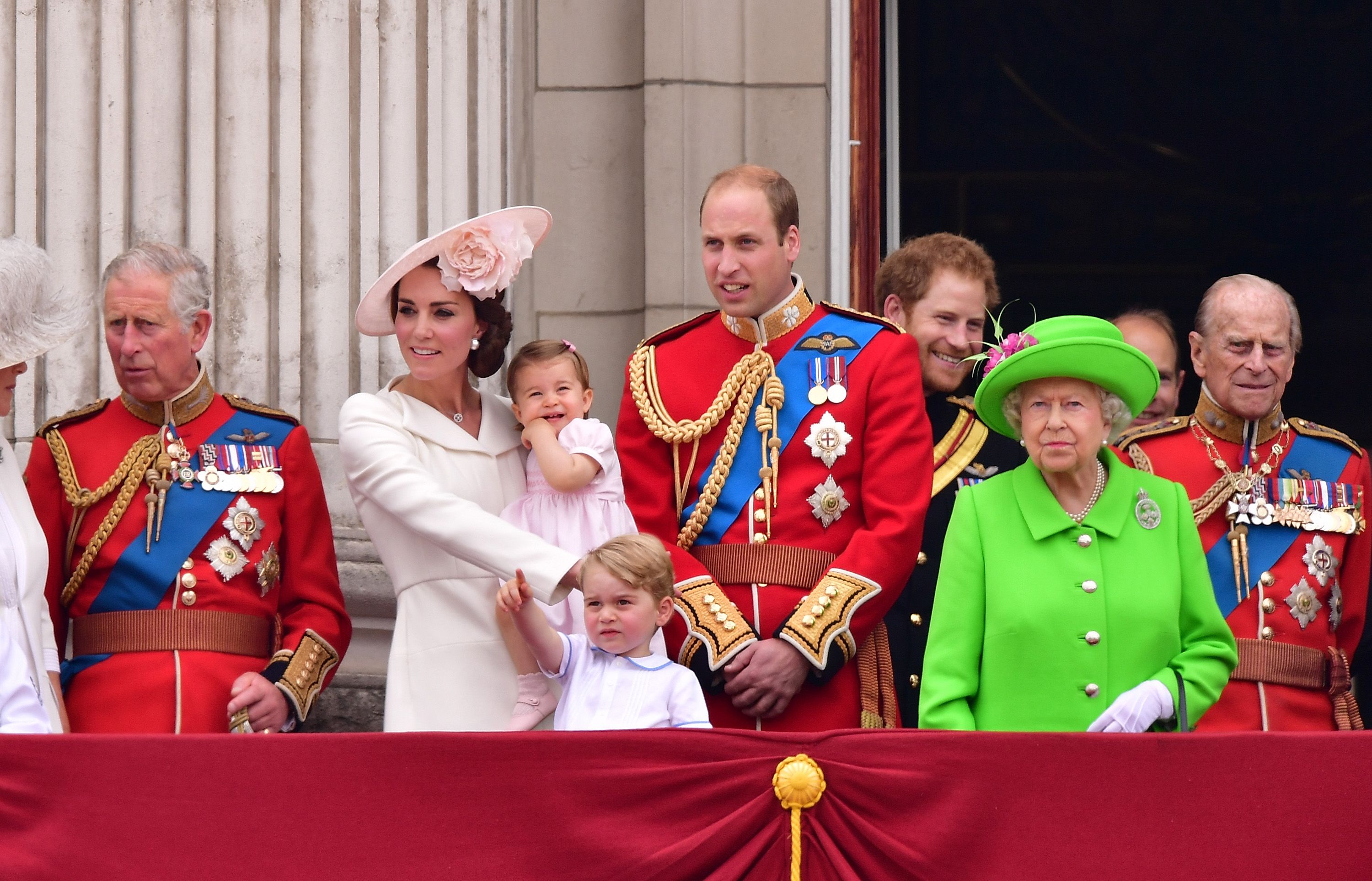 Prince Charles, Catherine, Duchess of Cambridge, Princess Charlotte, Prince George, Prince William, Prince Harry, Queen Elizabeth II and Prince Philip on the balcony during the Trooping the Colour marking the Queen's 90th birthday at The Mall on June 11, 2016. | Getty Images