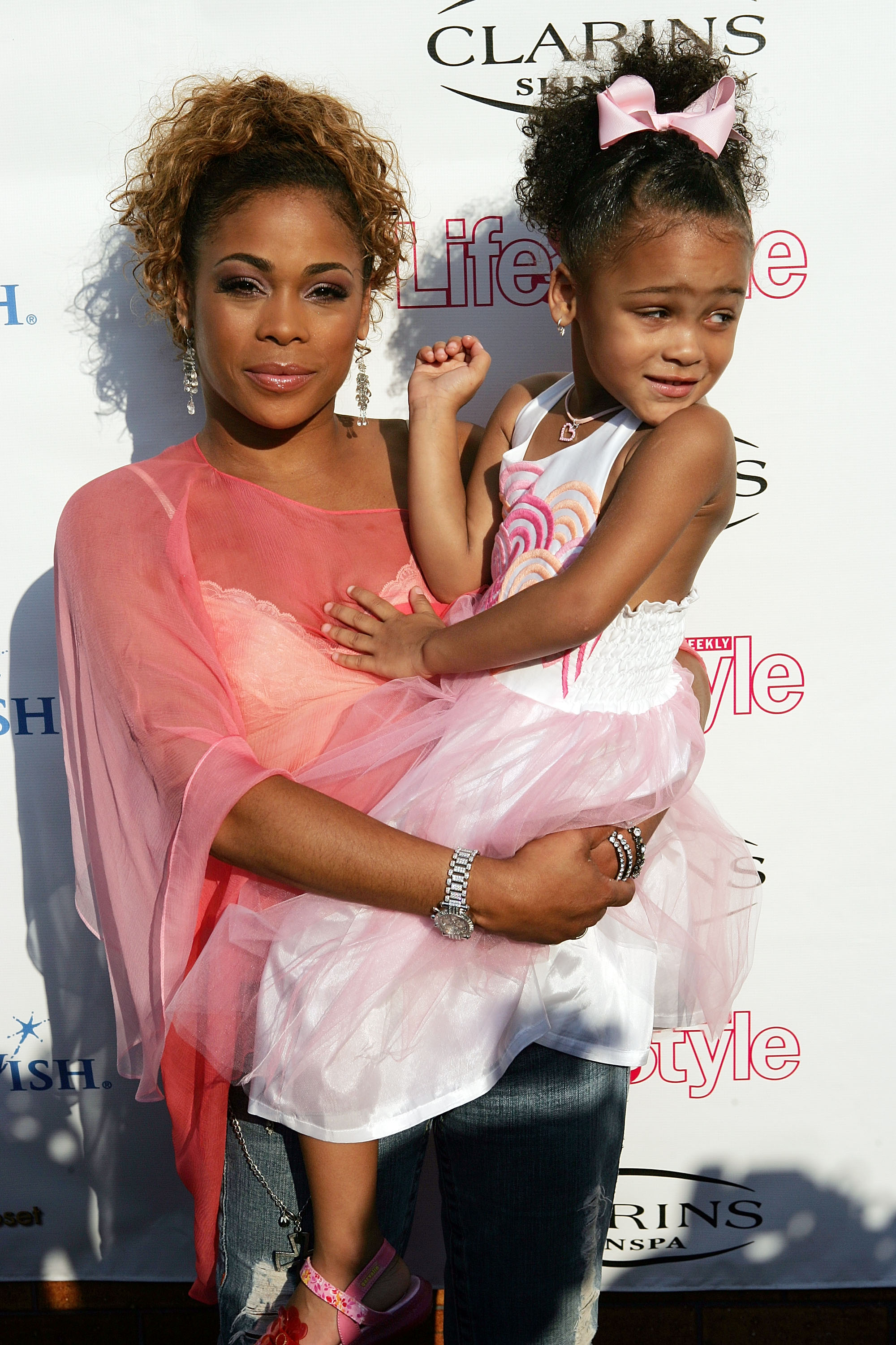 Tionne "T Boz" Watkins of TLC and her daughter, Chase Anela Rolison, arrive at a fashion show and party to benefit the Make A Wish Foundation at The Park August 2, 2005, in New York City. | Source: Getty Images