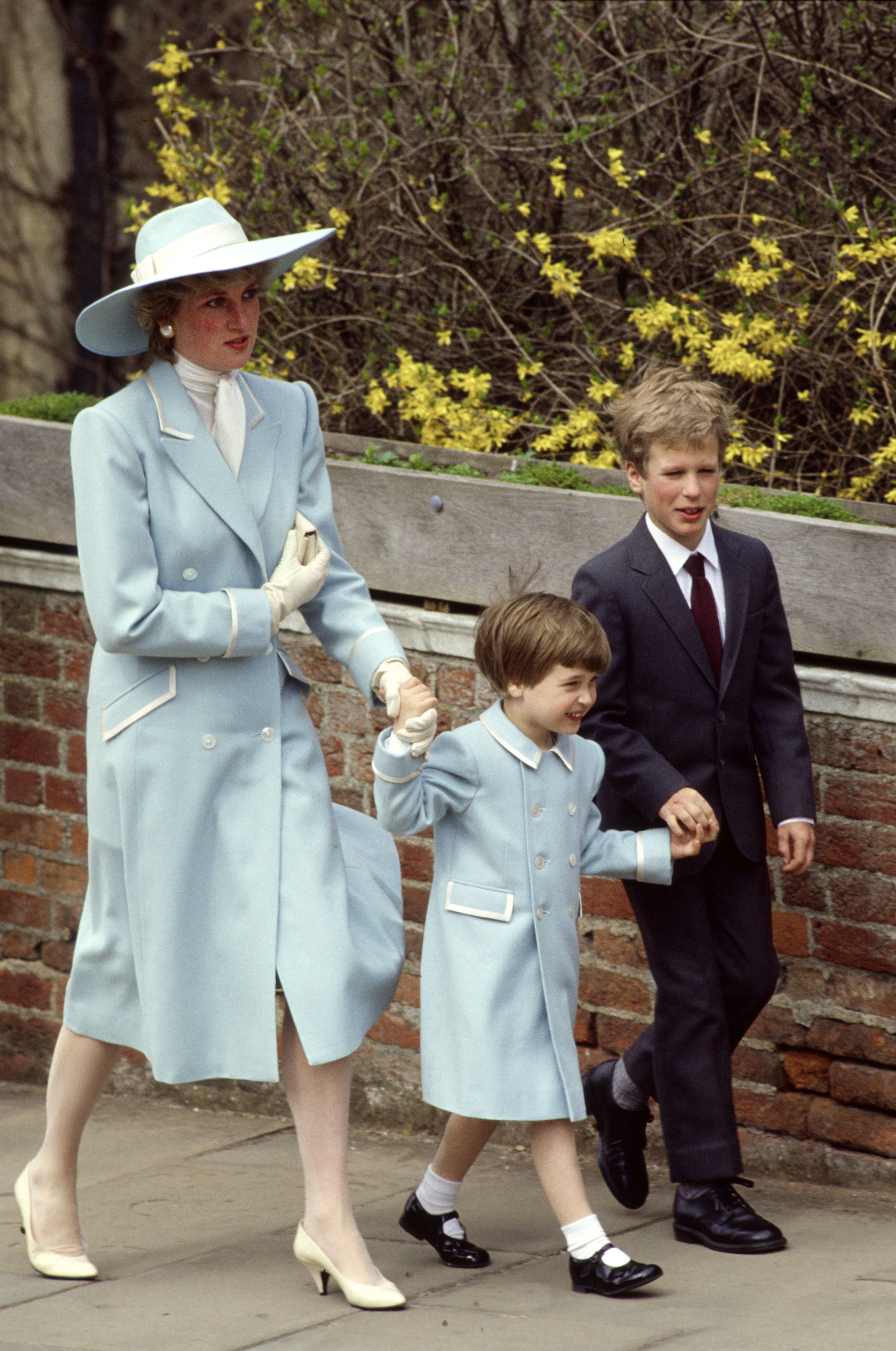 Diana, Princess Of Wales, with her Son, Prince William, and her nephew, Peter Phillips, on their way to Easter Service on April 19, 1987. | Source: Getty Images