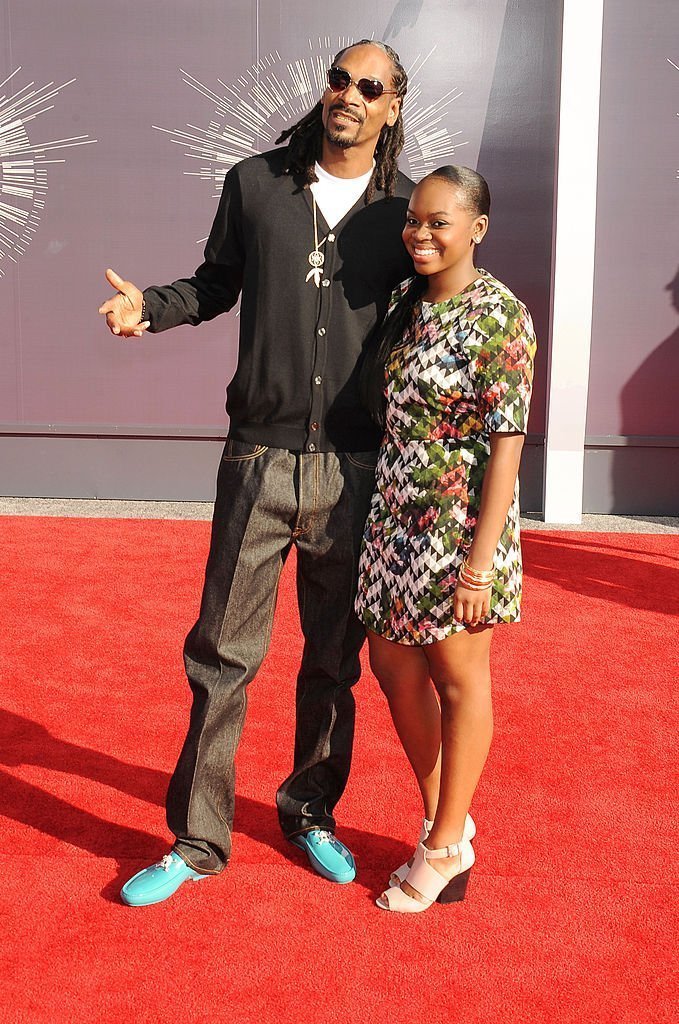 Snoop Dogg y Cori Broadus asisten a los MTV Video Music Awards 2014. | Foto: Getty Images