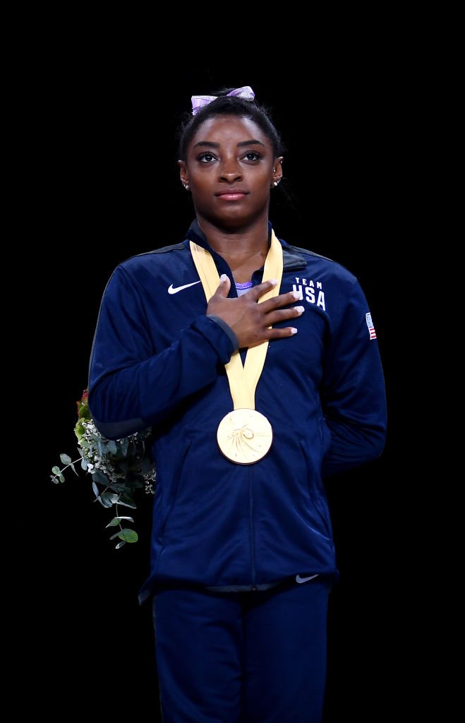 Gold medalist Simone Biles of The United States on the podium following the Women's Floor Final during day | Photo: Getty Images