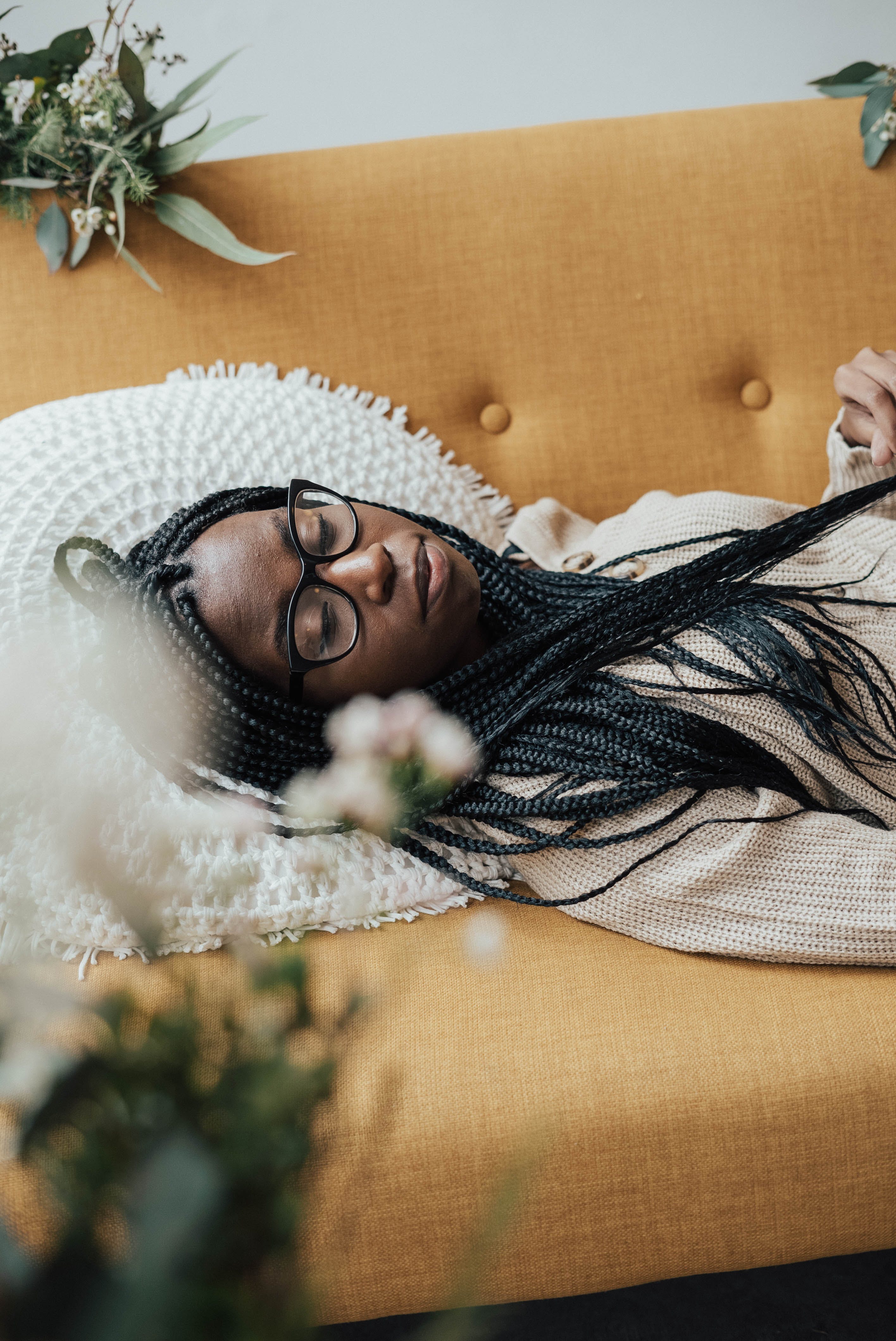 A woman sleeping on a couch | Source: Pexels