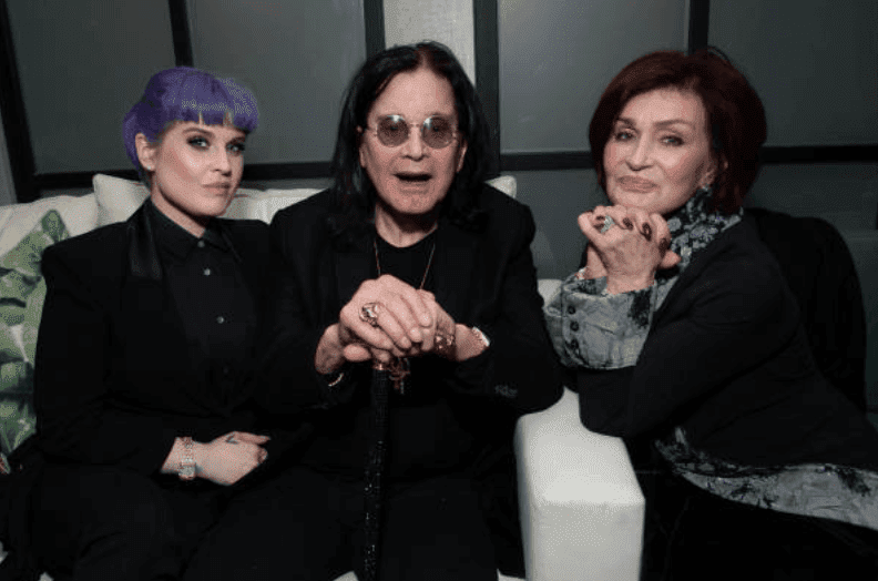 Kelly Osbourne, Ozzy Osbourne and Sharon Osbourne sit an couch while making an appearance at the after party for “A Million Little Pieces” on December 04, 2019, in West Hollywood, California | Source: Emma McIntyre/Getty Images