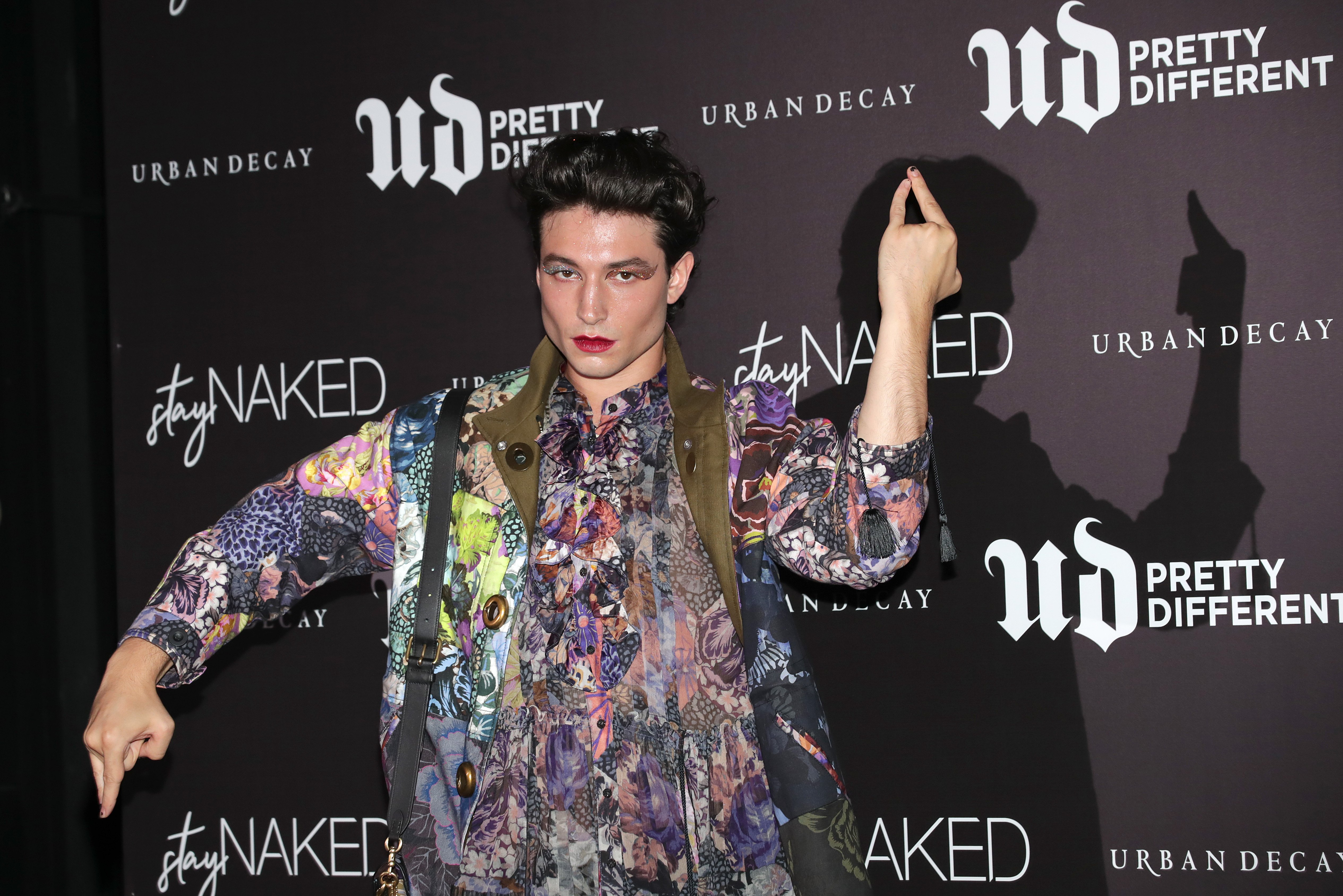 Ezra Miller at the photocall for Urban Decay's Stay Naked launch on August 20, 2019, in Seoul, South Korea | Source: Getty Images