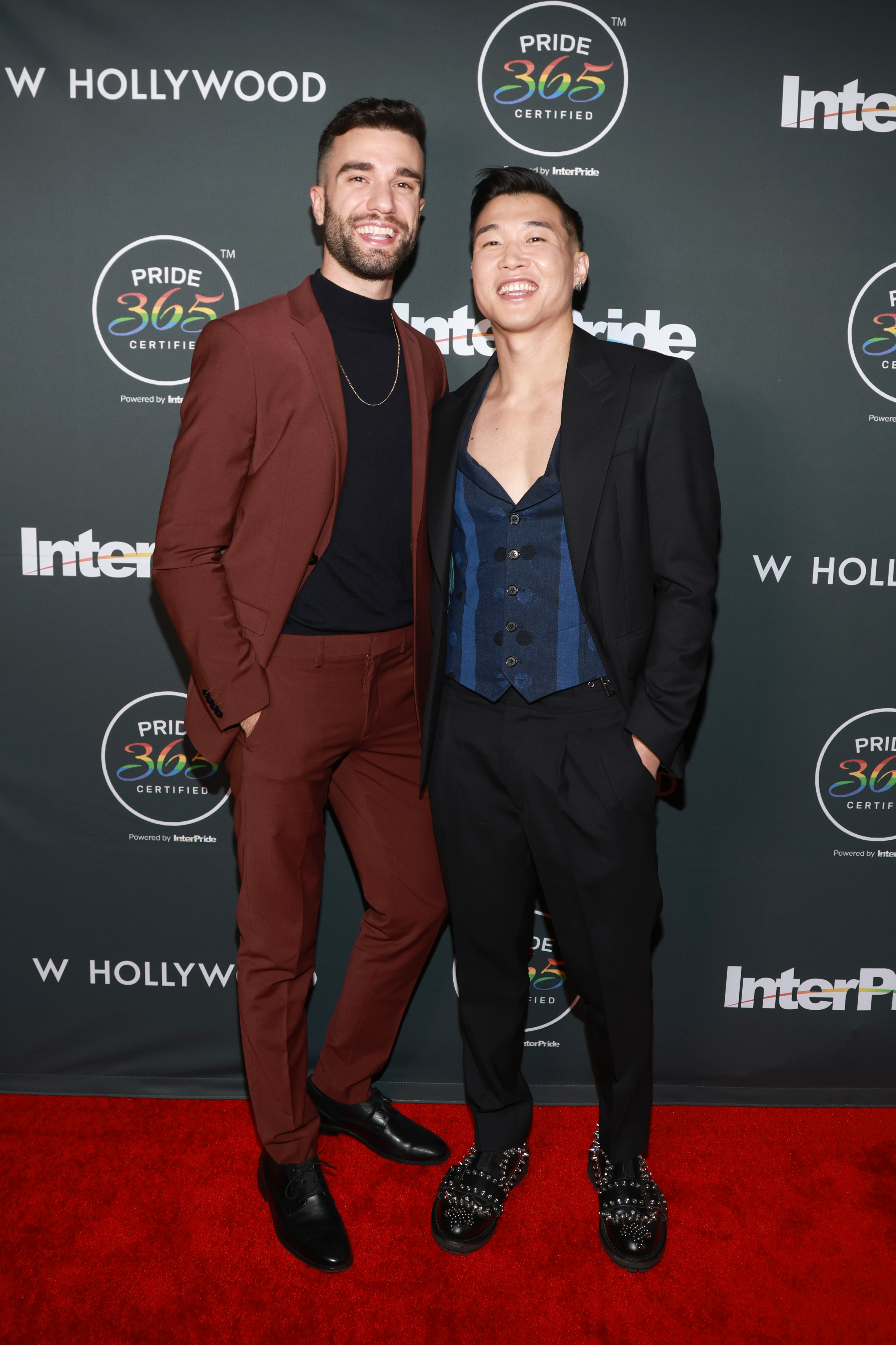 John-Michael Sudsina and Joel Kim Booster pose at InterPride Celebrates 40th Anniversary With Inaugural Global Gala at Avalon Hollywood & Bardot on April 29, 2023, in Los Angeles, California | Source: Getty Images
