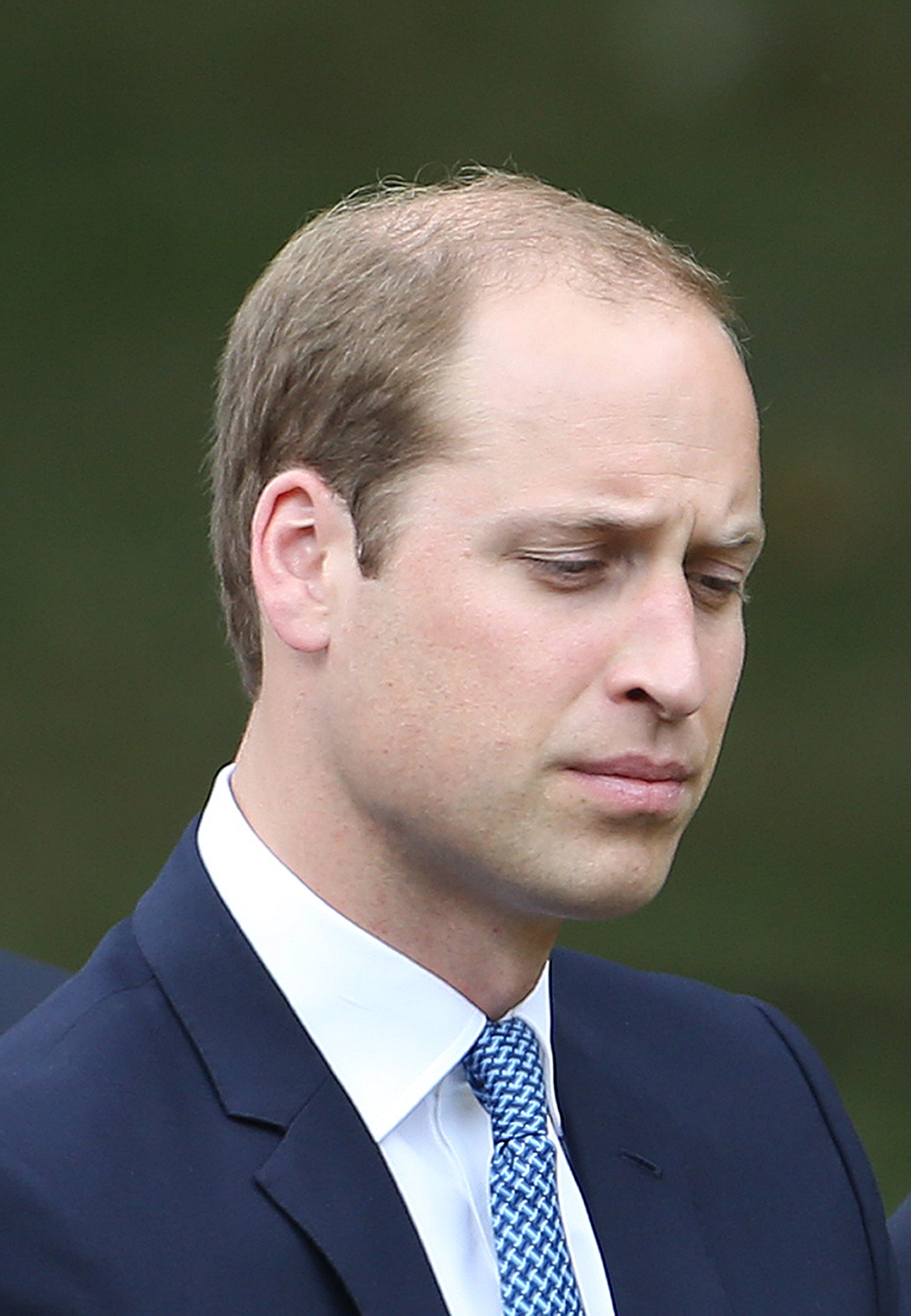 Britain's Prince William, Duke of Cambridge sits during a service at the 7/7 memorial in London's Hyde Park on July 7, 2015, | Source: Getty Images