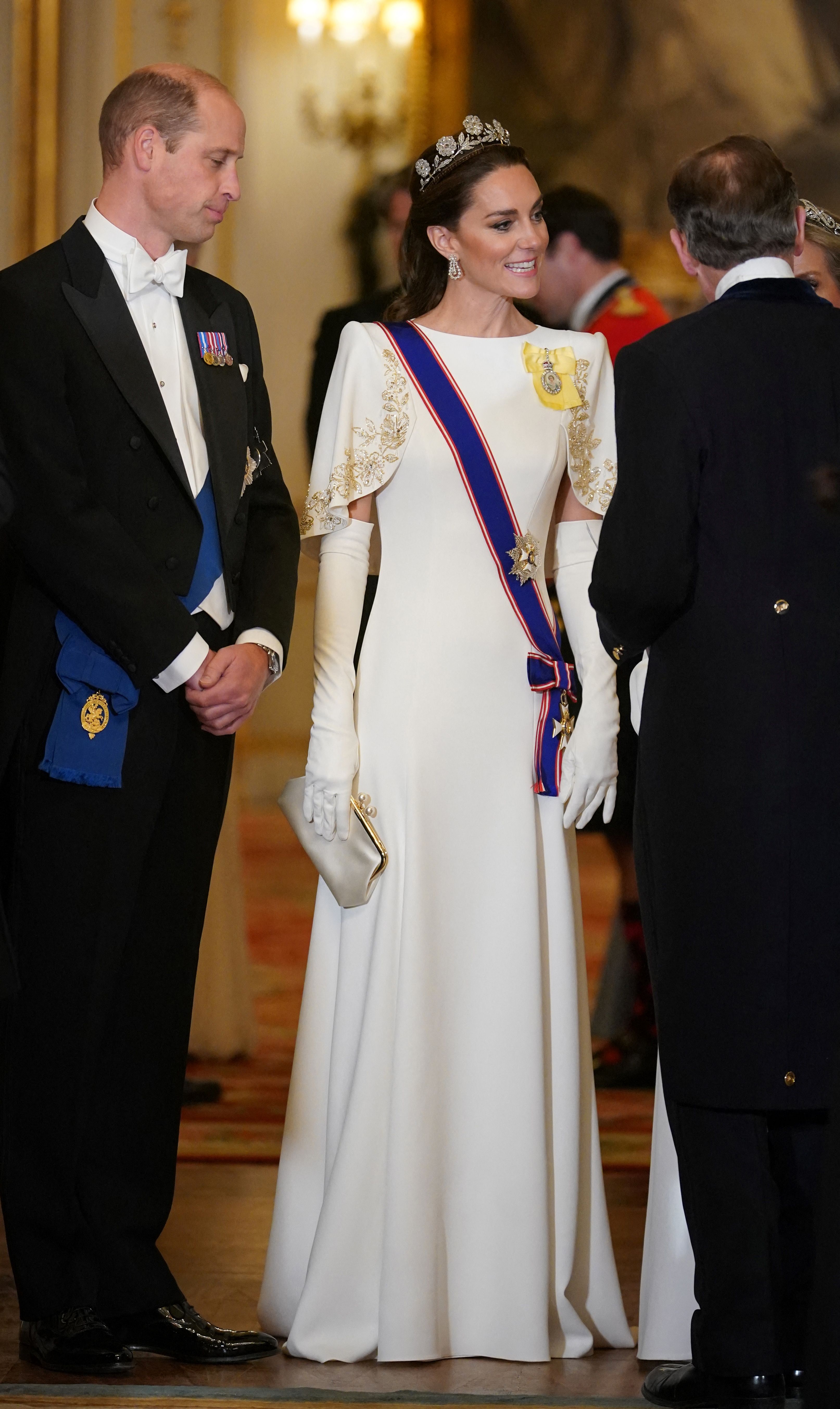 Prince William, Prince of Wales, and Catherine, Princess of Wales, arrive for a a State Banquet at Buckingham Palace in central London on November 21, 2023, for South Korea's President Yoon Suk Yeol and his wife Kim Keon Hee on their first day of a three-day state visit to the UK. | Source: Getty Images