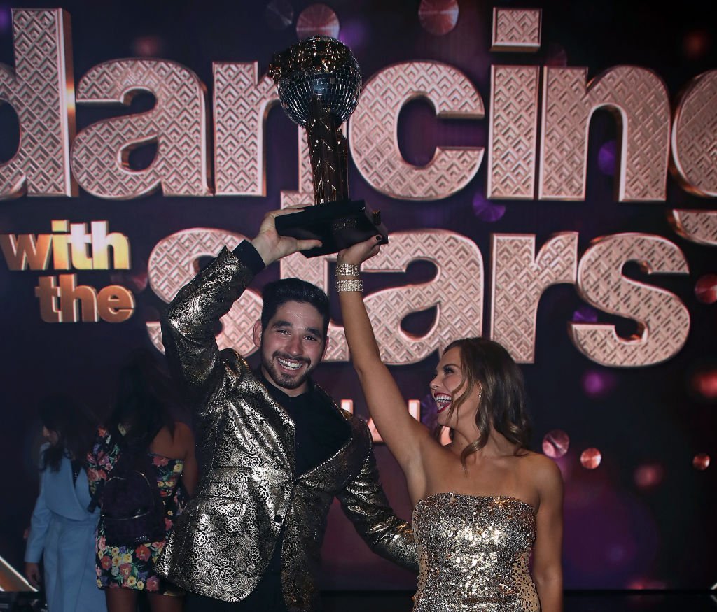 Alan Bersten and Hannah Brown pose at "Dancing with the Stars" Season 28 Finale at CBS Television City | Getty Images