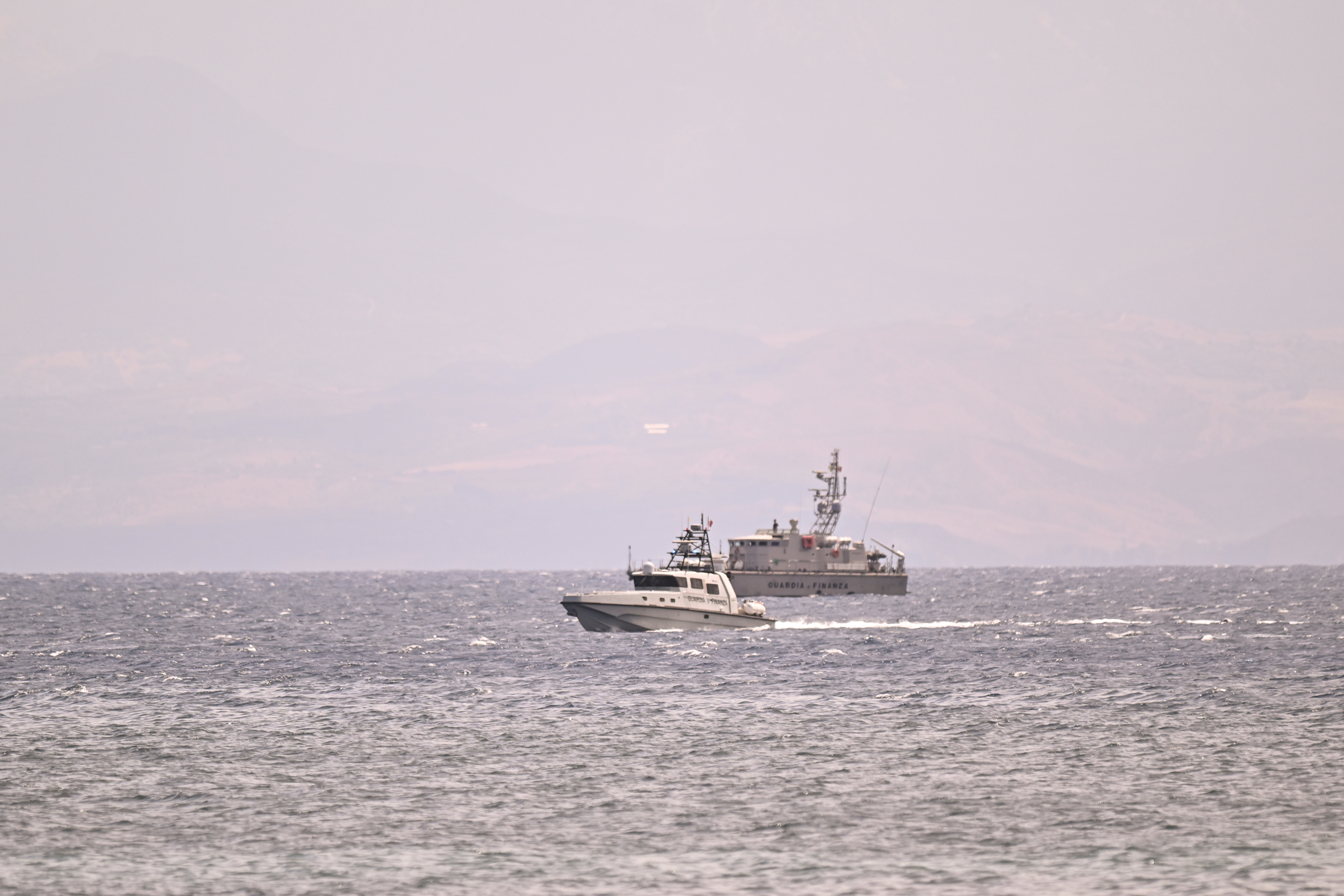 Coast guard vessels assist the search for missing passengers in Porticello, Italy on August 19, 2024 | Source: Getty Images