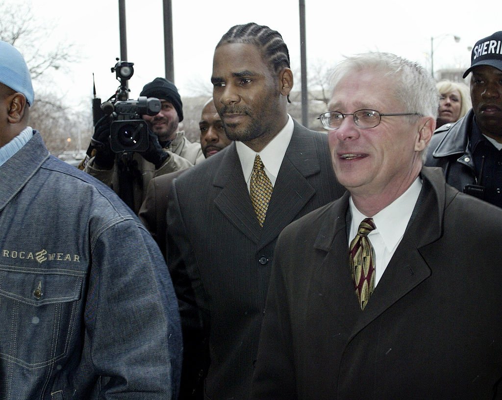 R. Kelly heads to court December 20, 2002 in Chicago, Illinois. He faced 21 counts of child pornography. | Source: GettyImages